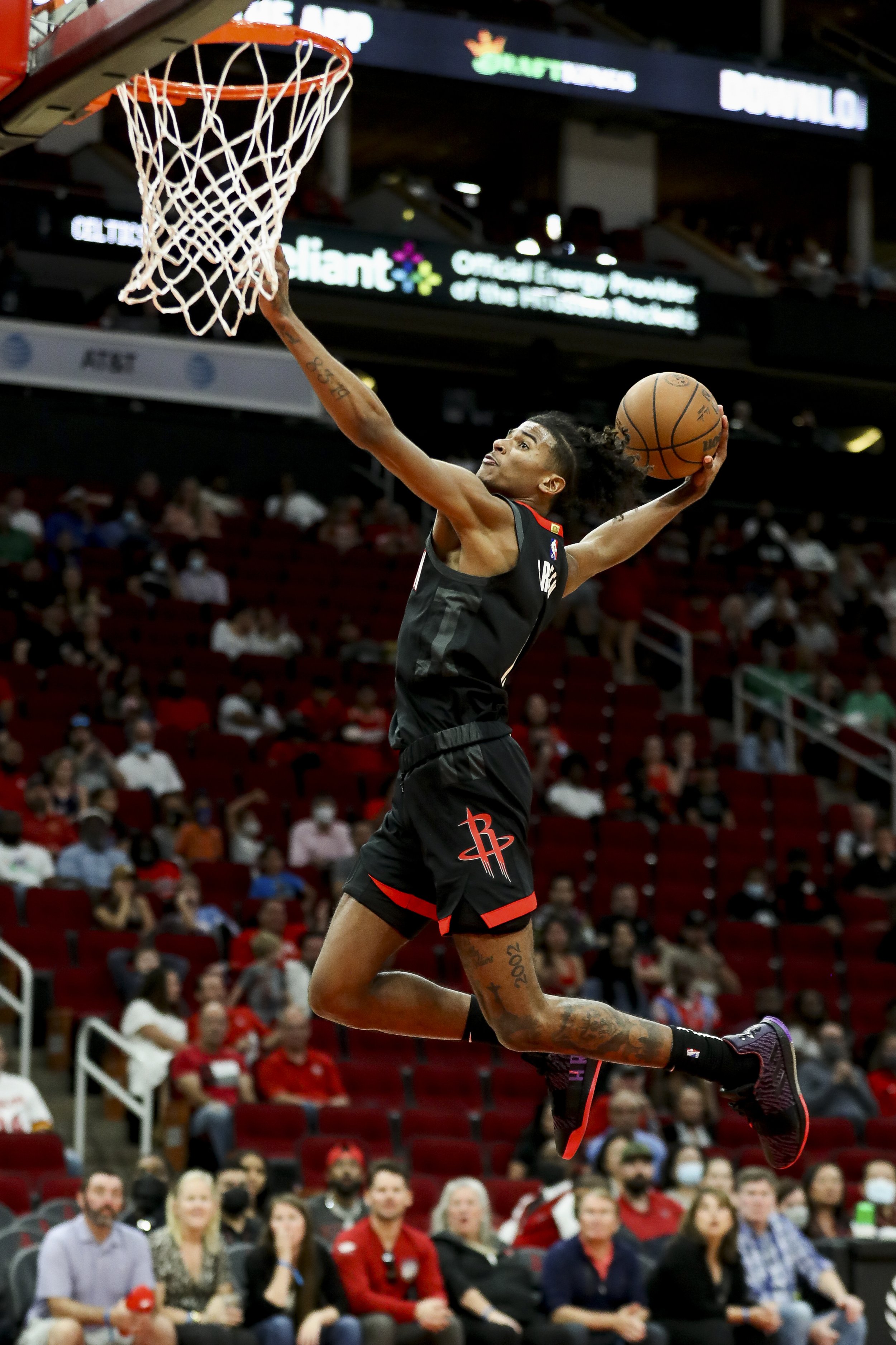  Houston Rockets guard Jalen Green (0) dunks the ball against the Boston Celtics during the second half of an NBA game at the Toyota Center on Sunday, Oct. 24, 2021, in Houston. The Celtics won 107-97. 