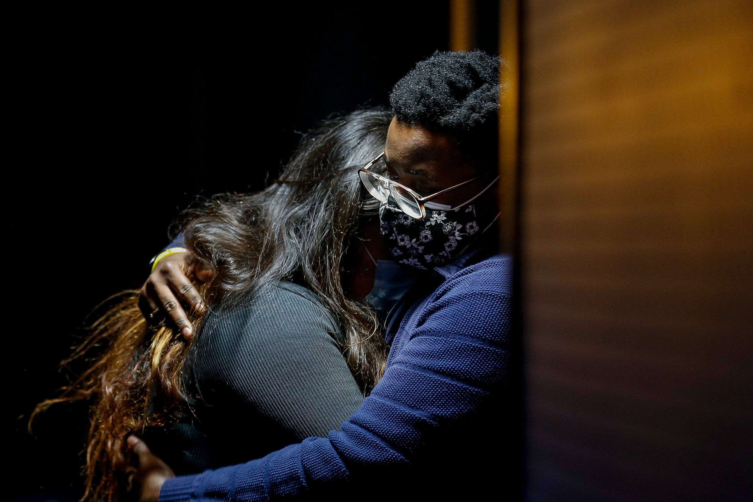  Nick Tripp, right, comforts their wife Cristal Solares-Bockmon after paying respects during the memorial service for transgender rights advocate Monica Roberts, 58, at University of Houston’s Cullen Performance Hall on Saturday, Oct. 24, 2020, in Ho