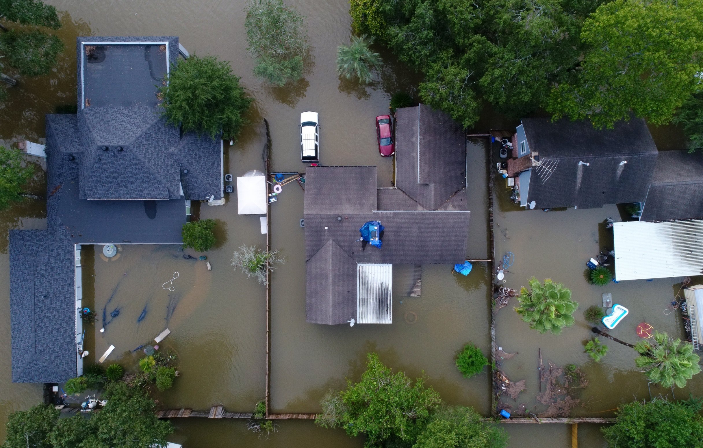  Flooded homes in the Lochshire neighborhood Friday, Sept. 20, 2019, in Huffman, Texas. Tropical Storm Imelda dumped 43 inches of rain in the greater Houston area. 