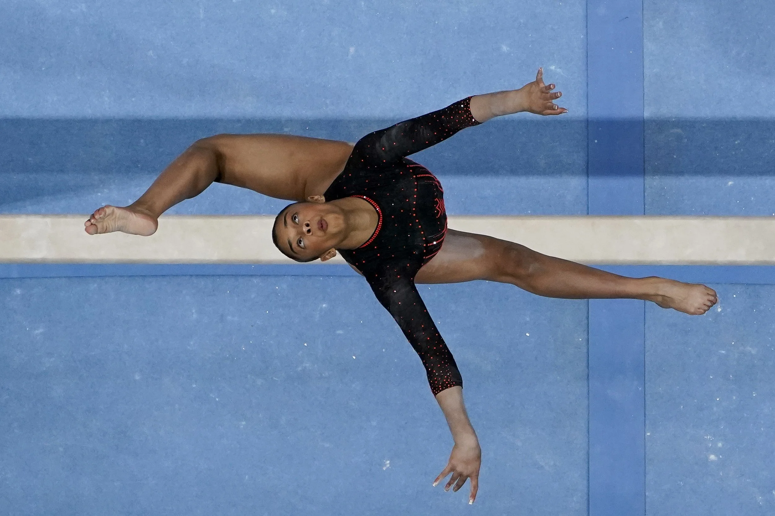 Tiana Sumanasekera competes on the beam during the U.S. Gymnastics Championships, Sunday, Aug. 27, 2023, in San Jose, Calif. (AP Photo/Godofredo A. Vásquez)