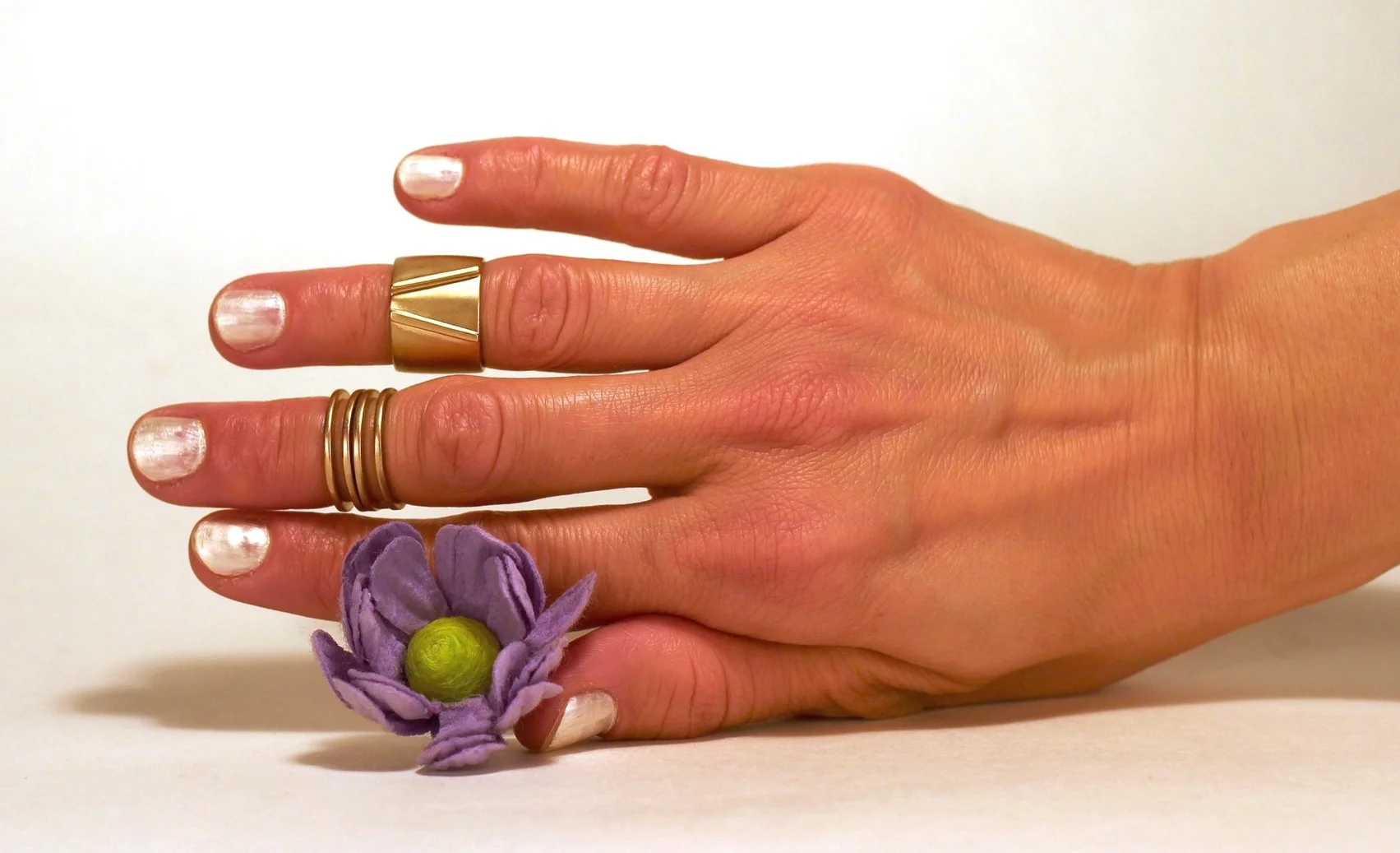 Gateway Ring & 2 Slices (on hand w flower)_4.JPG