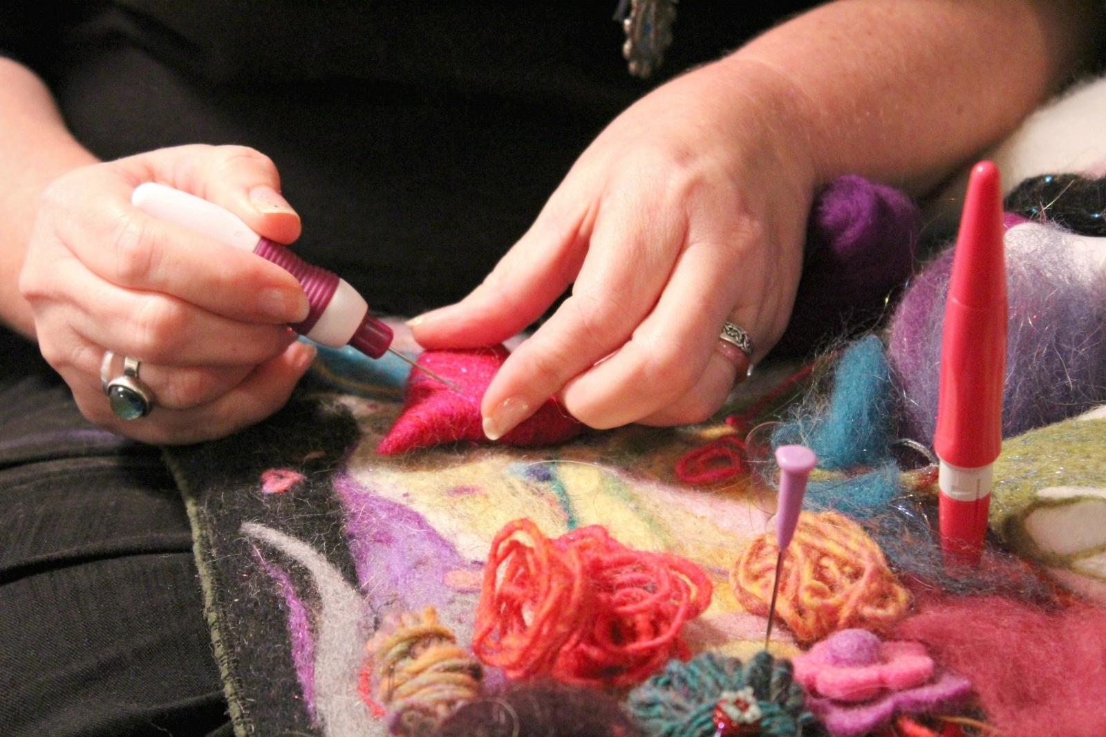 needle felting process with colorful wool