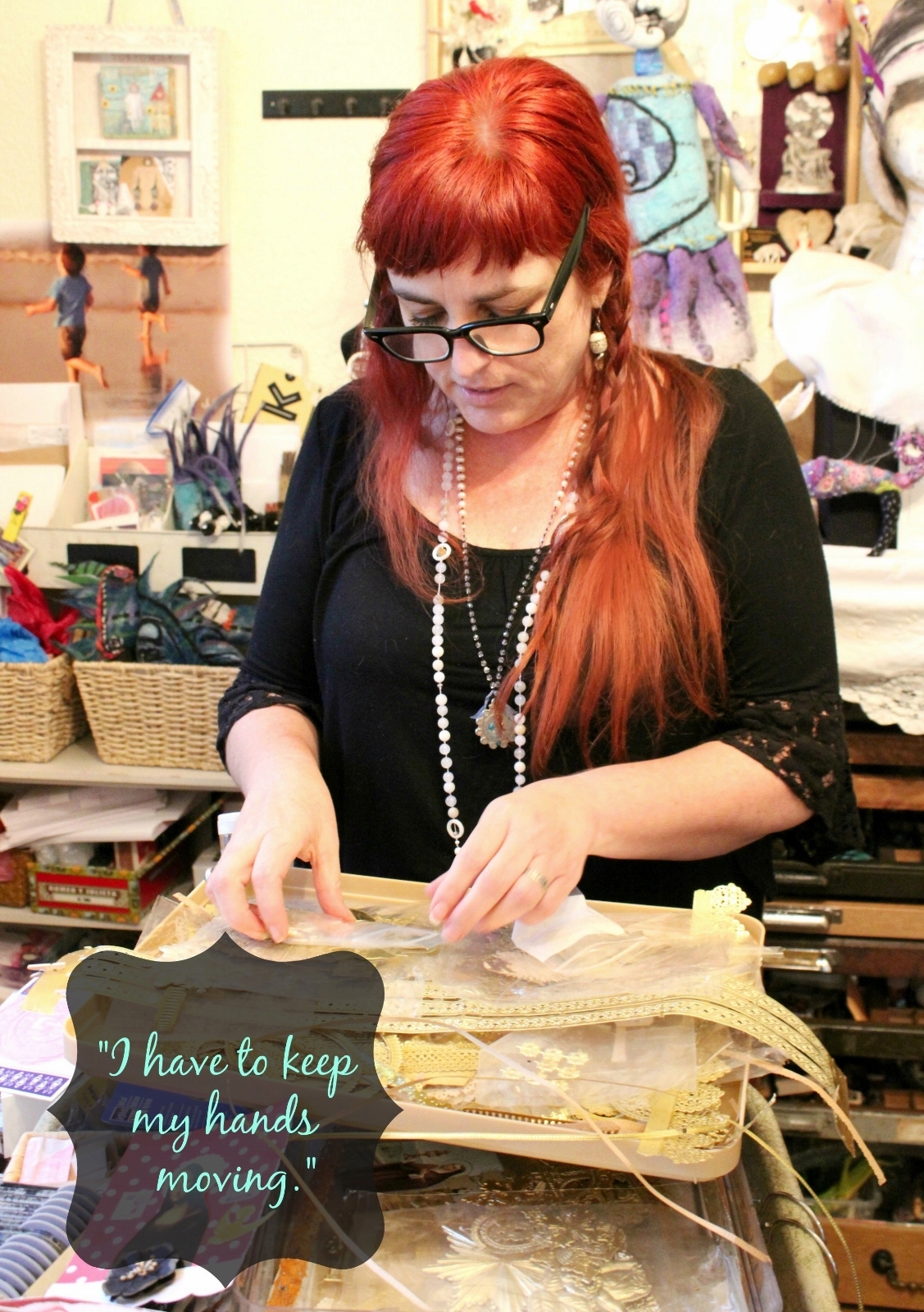 Artist Caroline Daley working in her studio
