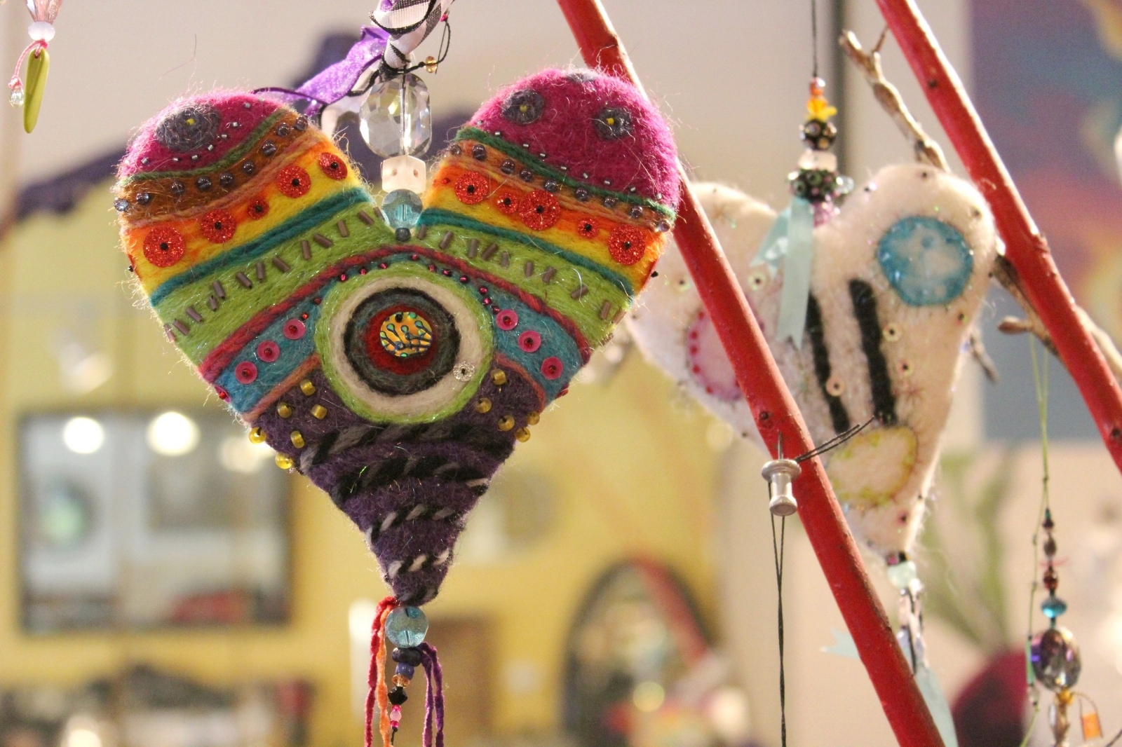 colorful felted heart ornament by Caroline Daley