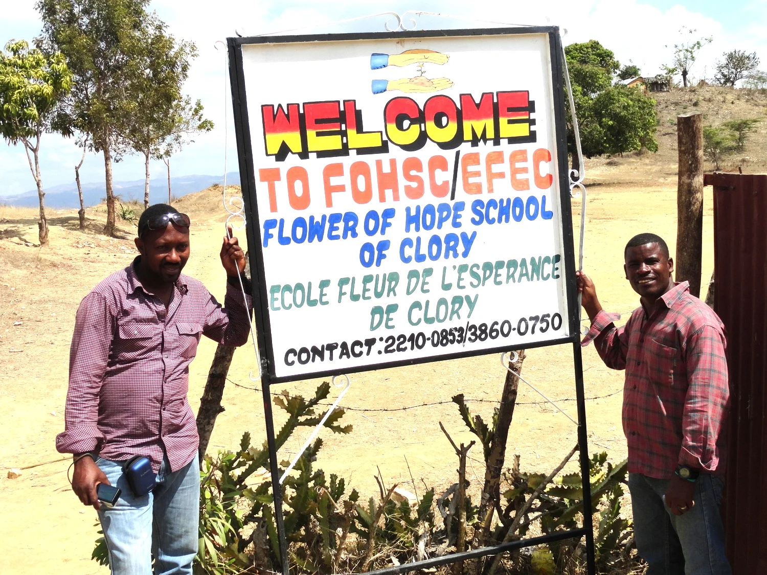 Theard and Manno with Sign 2013.jpg