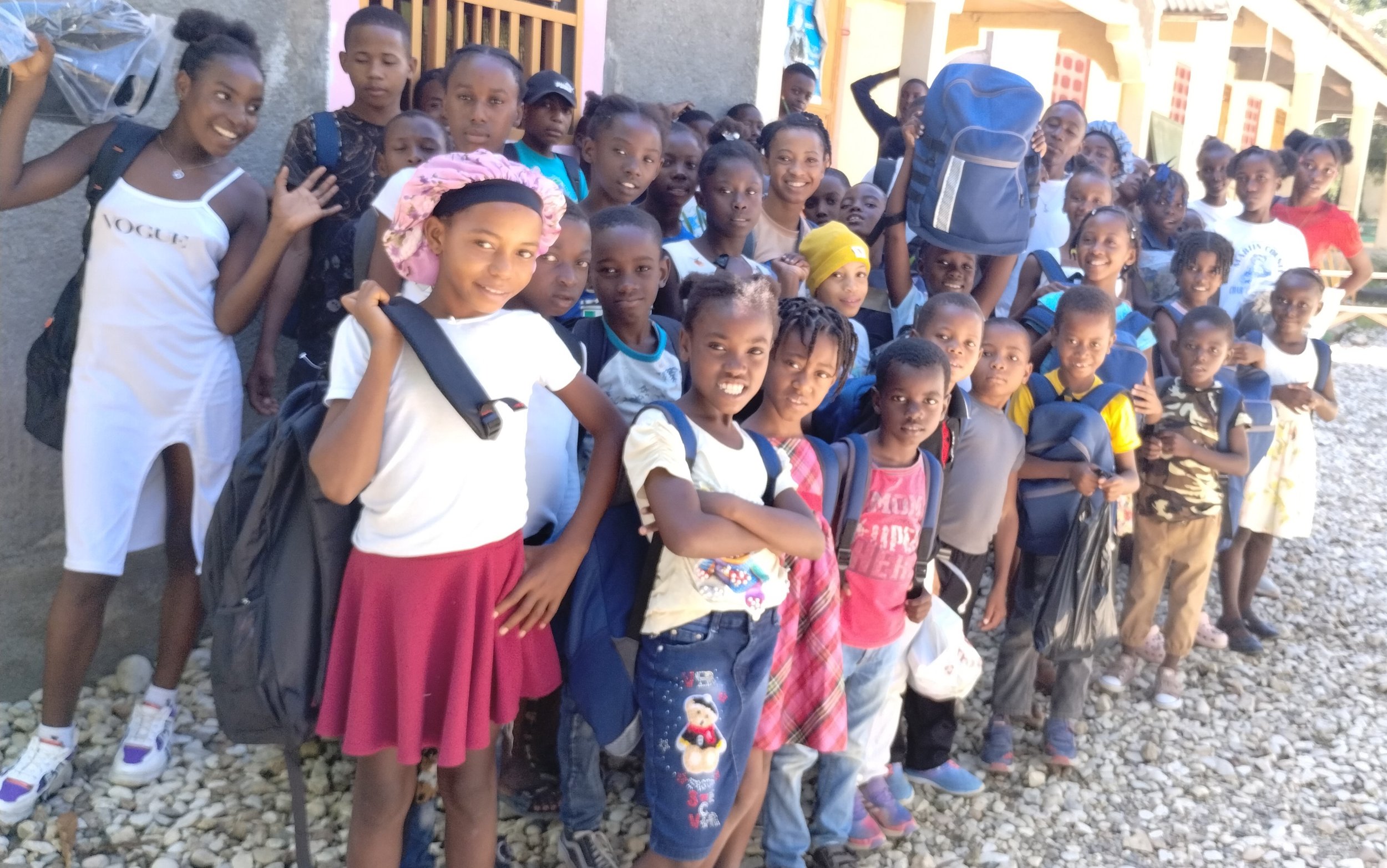 Copy of Kids with supplies Oct. 2024.jpg