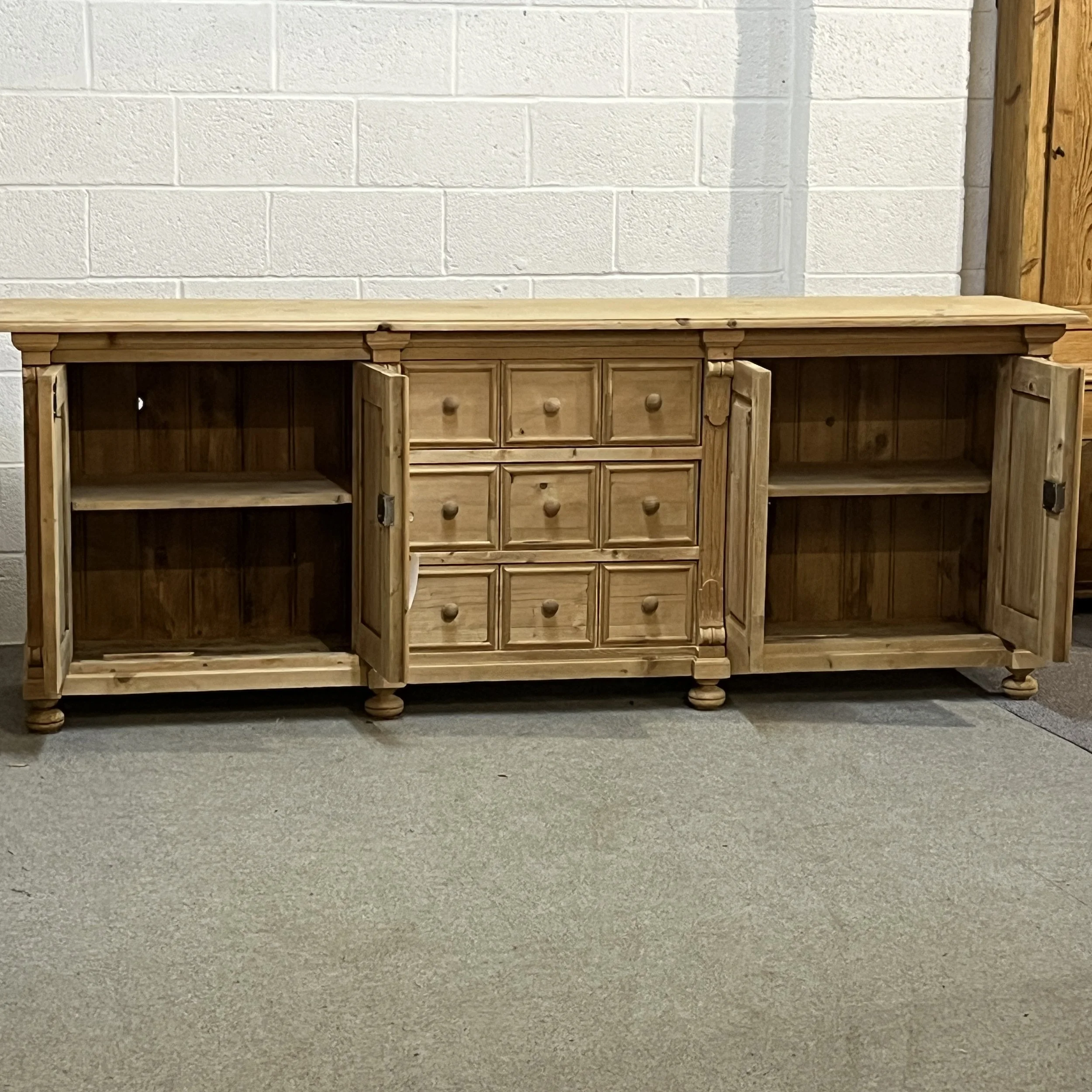 Pine sideboard N7102E with both cupboards open, showing a shelf in each compartment