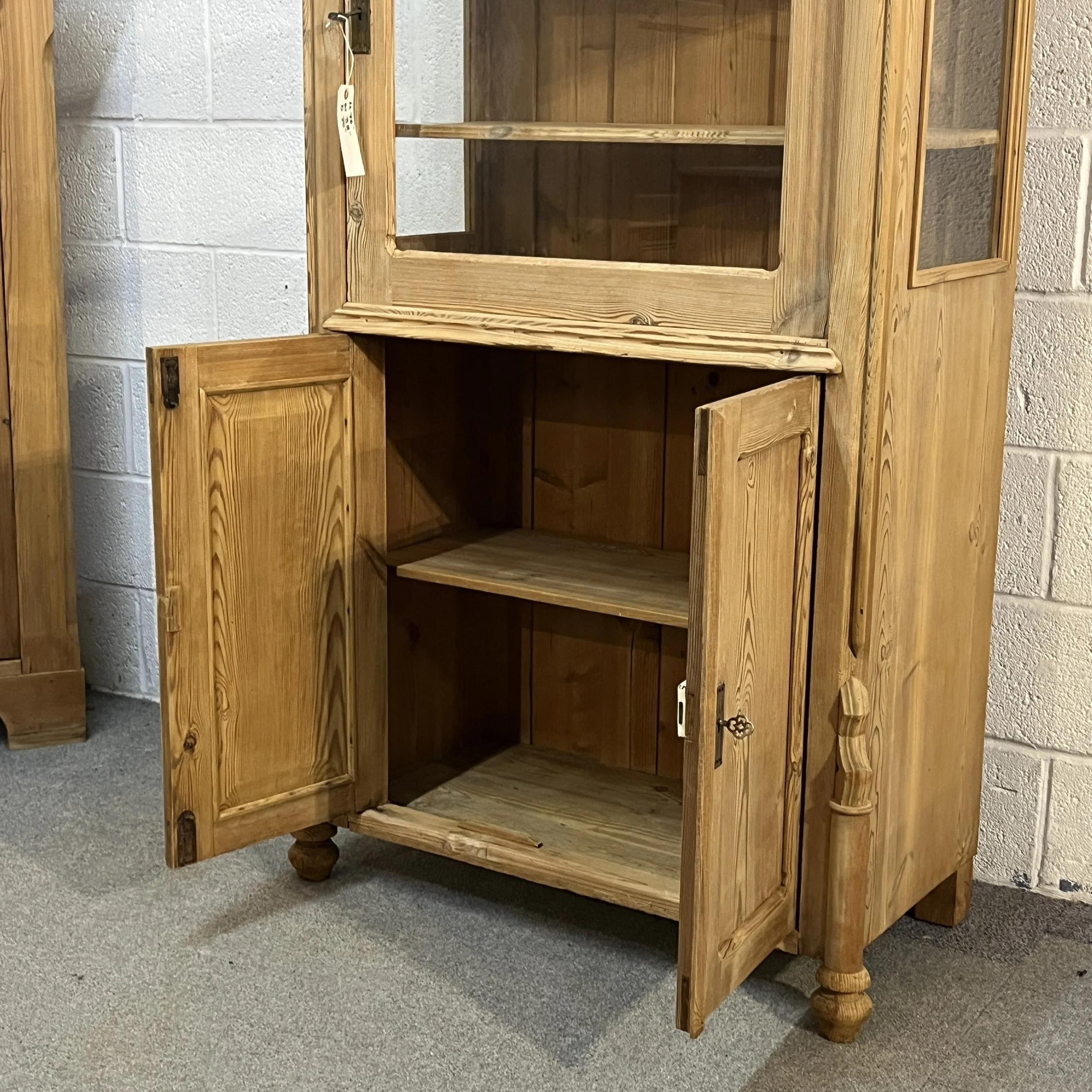Lower cupboard interior, shelf and panelled doors of antique pine cabinet N3404D