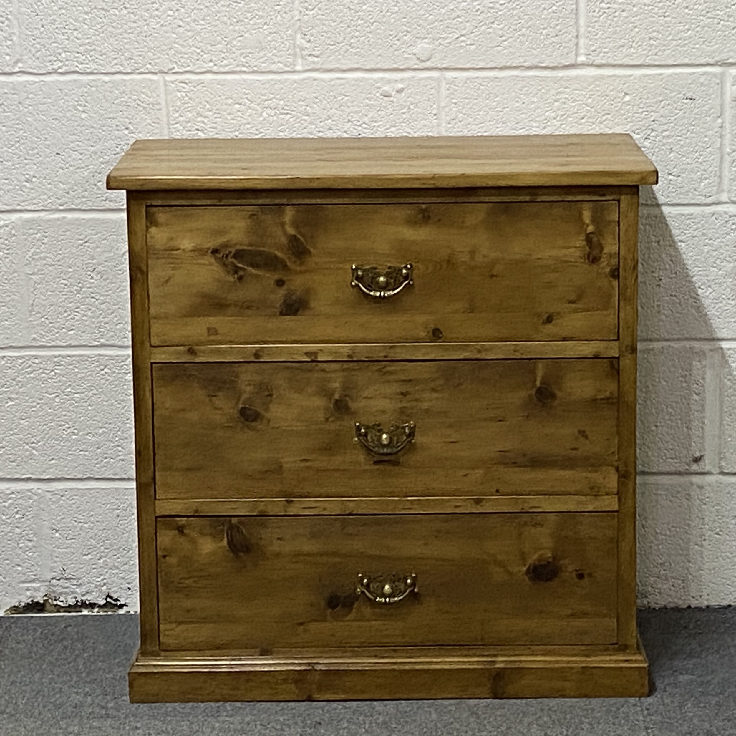 Small chest of drawers made from old pine floorboards