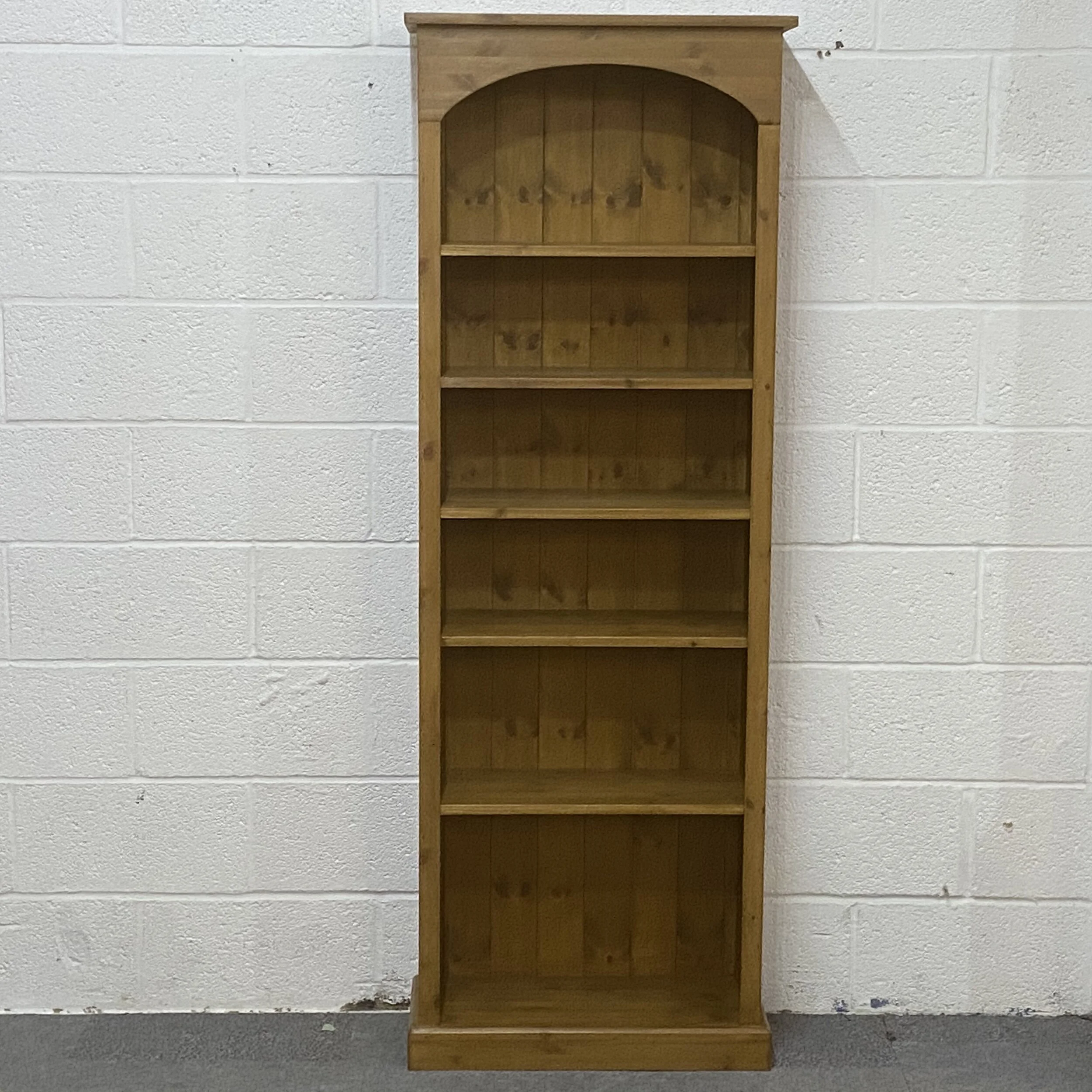 Tall slim waxed pine bookcase