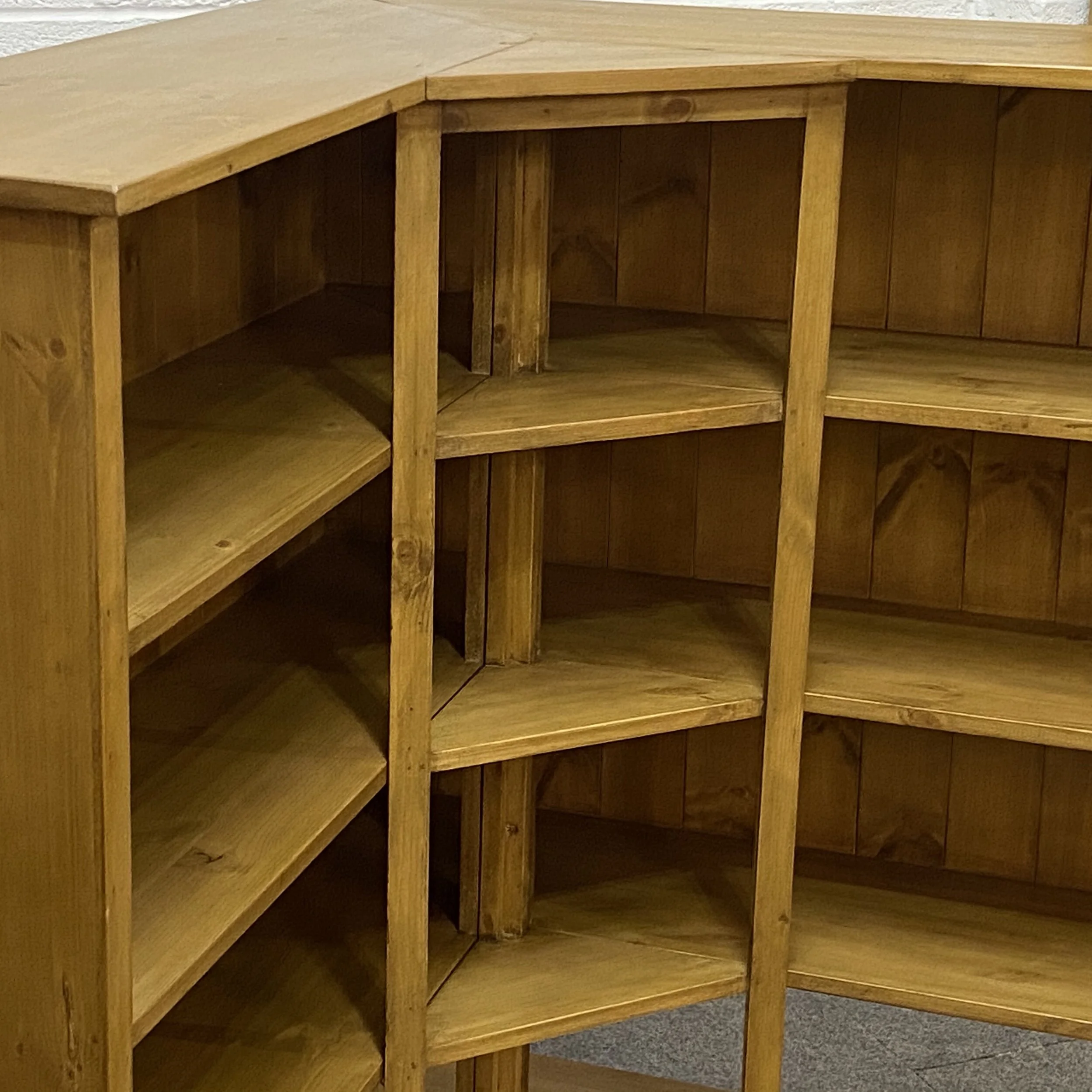 Corner pine bookcase low