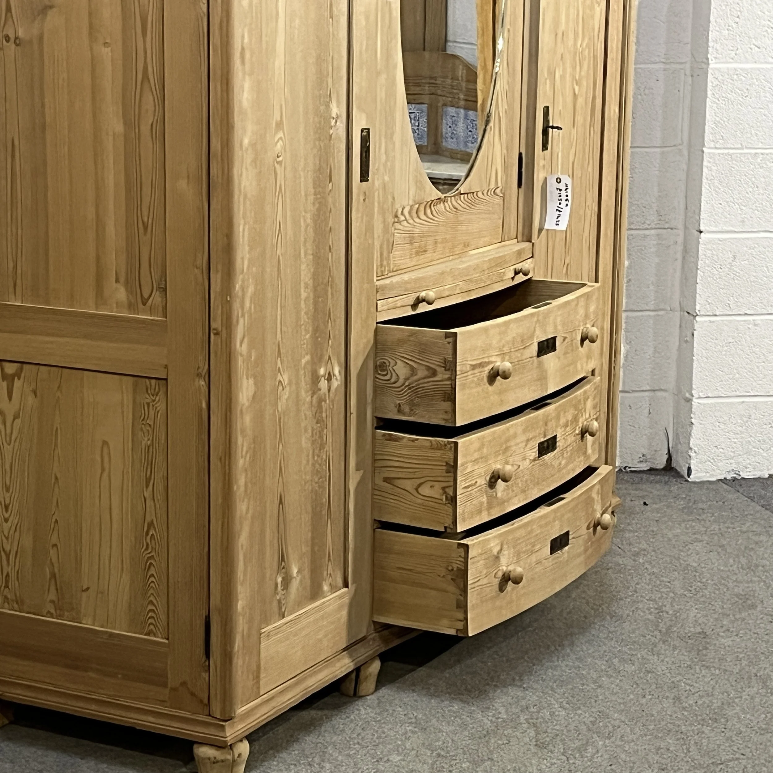 N4105H three curved-front drawers open beneath the vanity surface