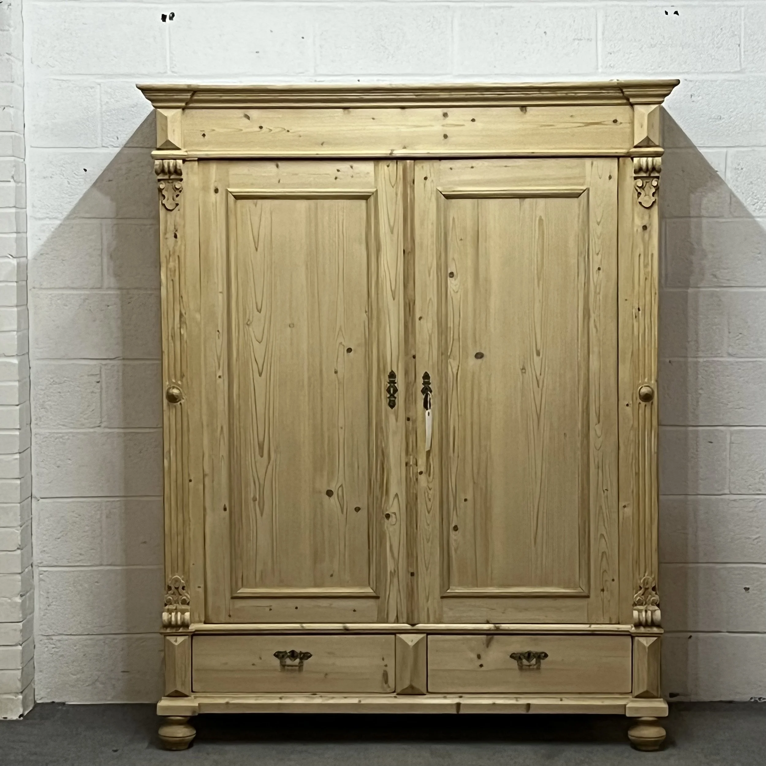 Light coloured pale antique pine wardrobe