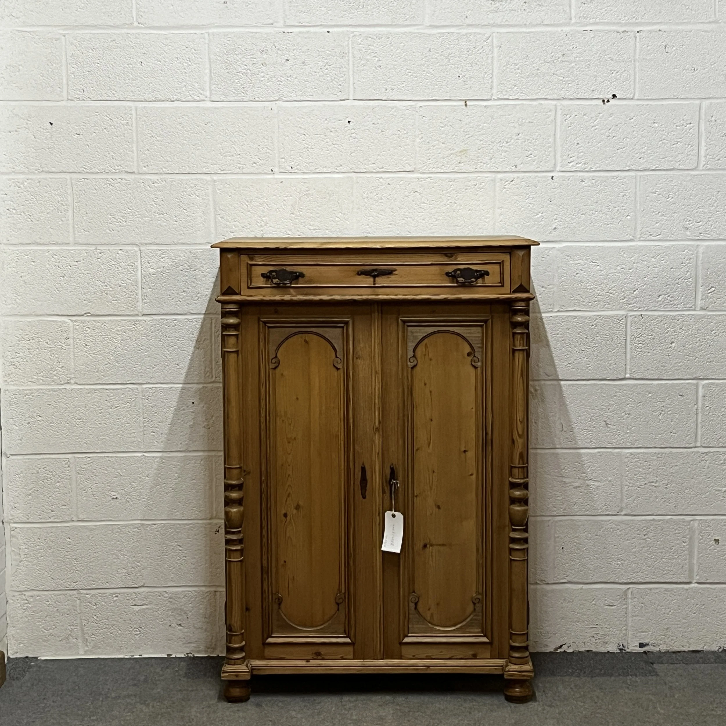 Tall Slim Waxed Pine 2 Door Cupboard WIth Top Drawer