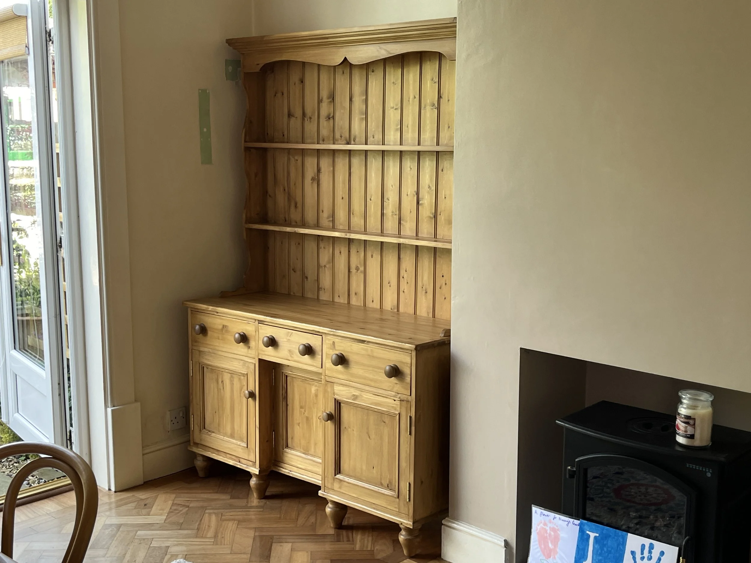 Pine dresser with open rack, 3 drawers above 3 doors