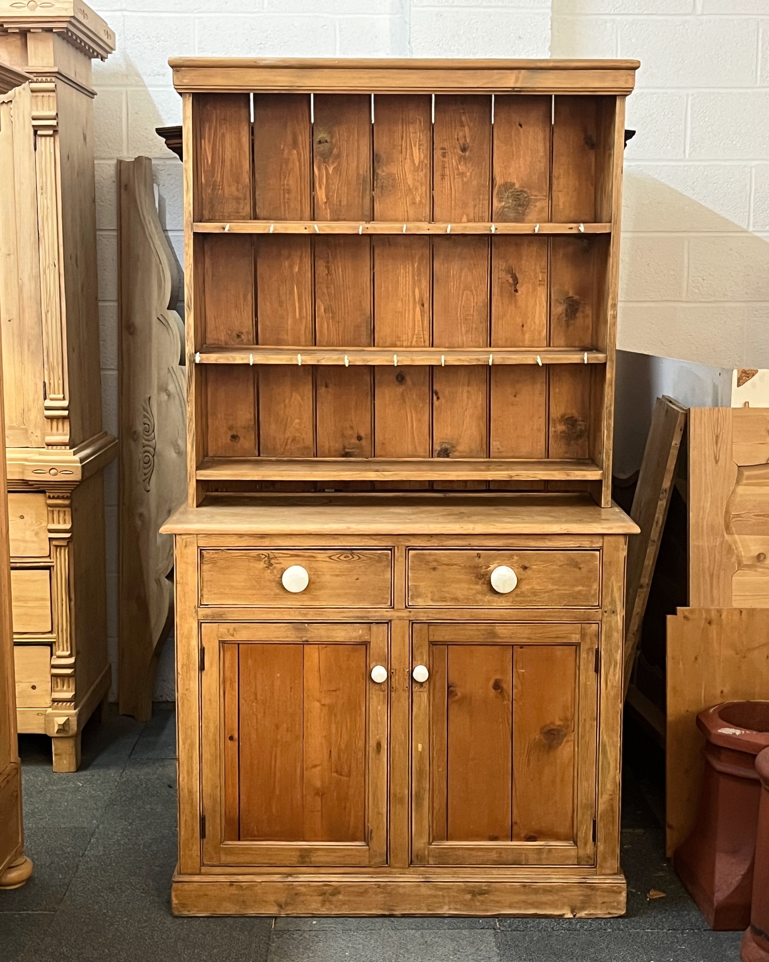 Two beautiful new pieces just come in!

The first piece(L4202C) is a lovely 1920's English dresser, with white hooks and white porcelain knobs, the height is 36"/76", width is 42", depth is 18.5", it is going for &pound;625 bare a