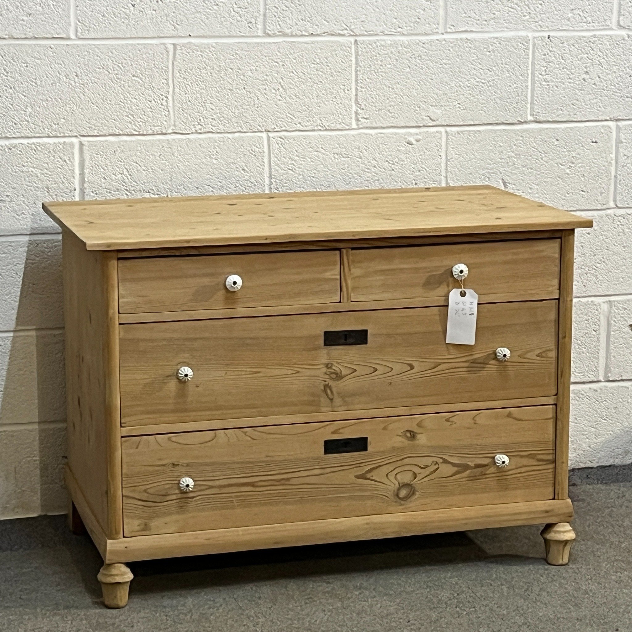 N7905C German 1930s pine chest — angled front view with four drawers