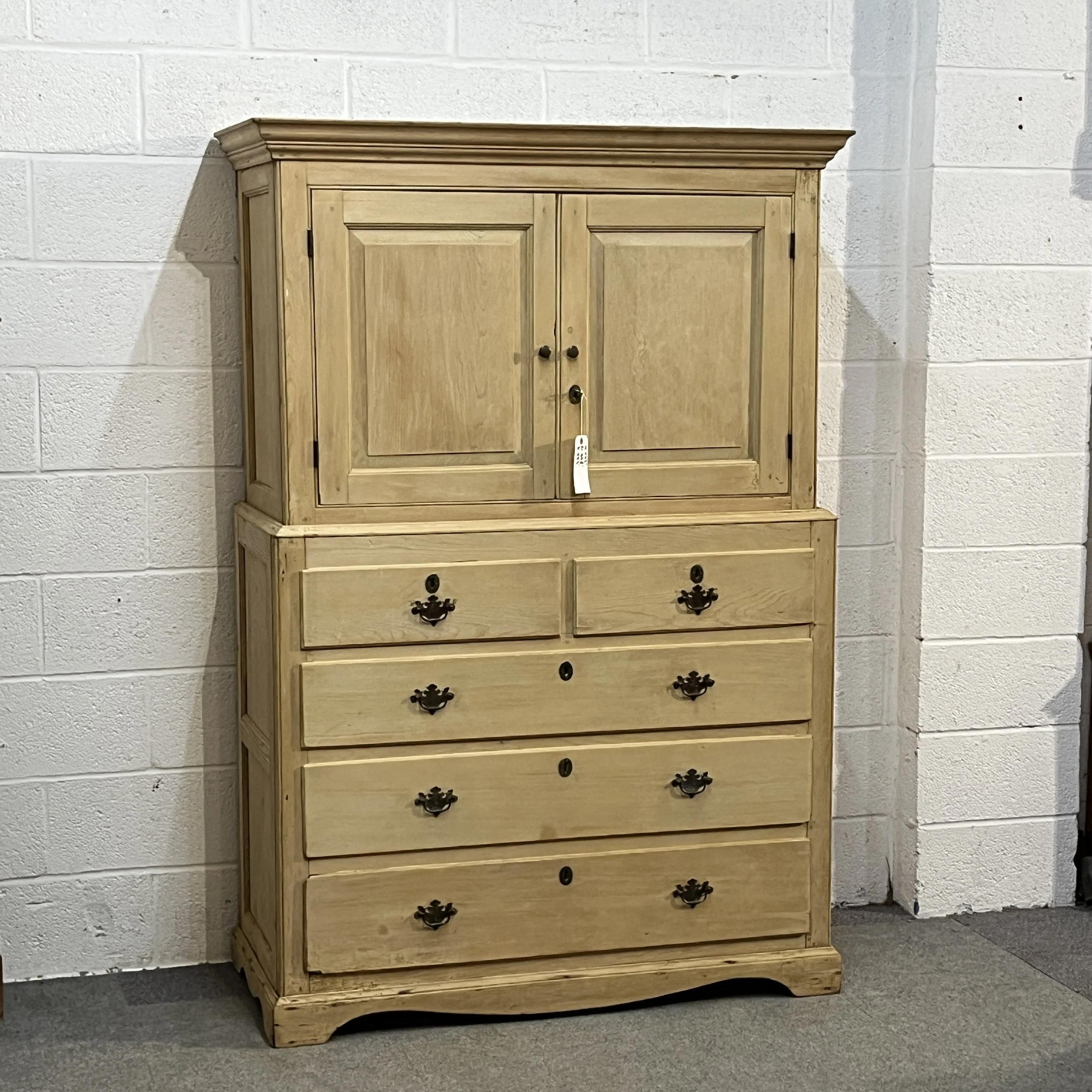 Full exterior view of early Victorian pine linen press N3508H