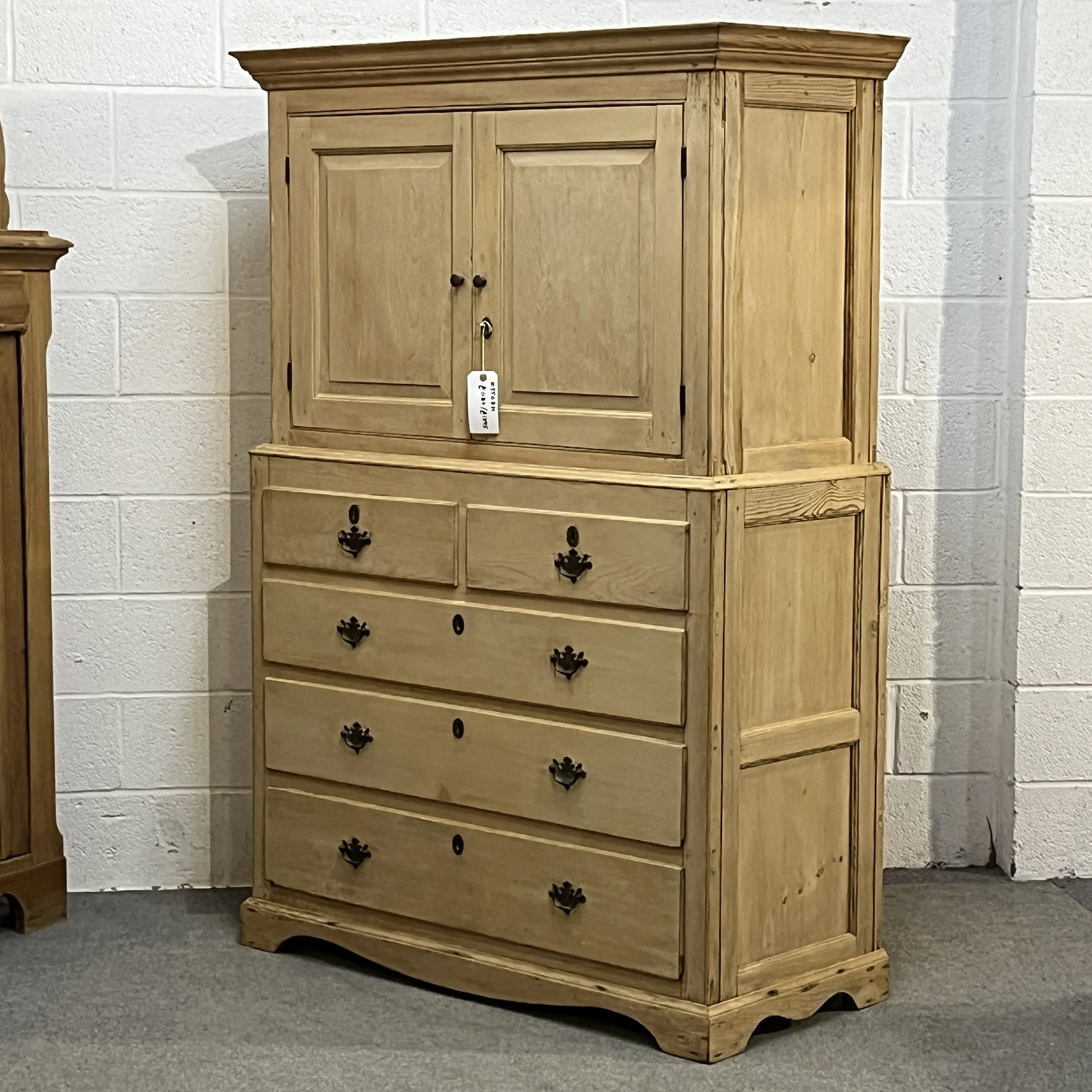 Right-side angle of pine linen press N3508H showing panelled side
