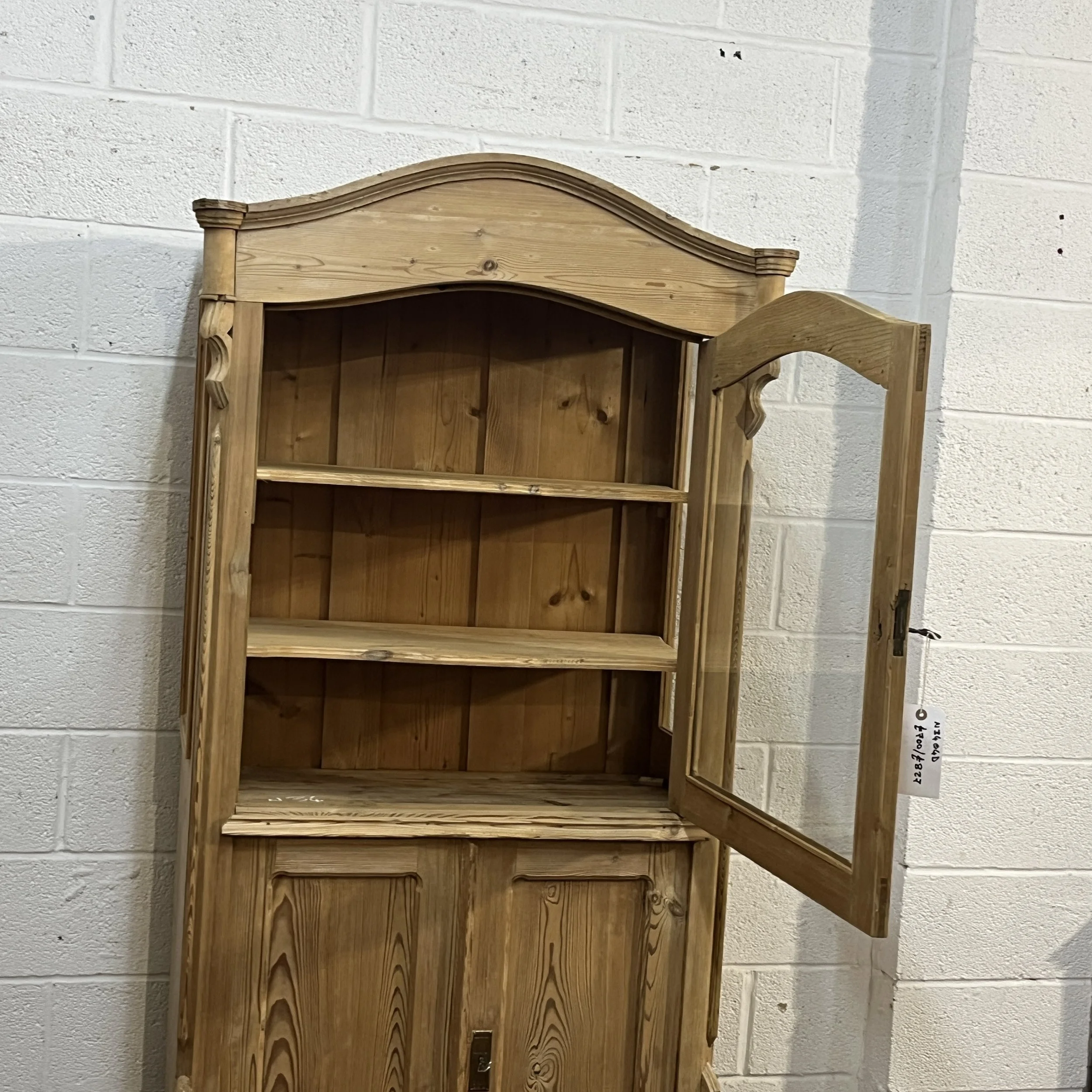 Antique pine cabinet N3404D with upper glazed door open, showing two shaped shelves