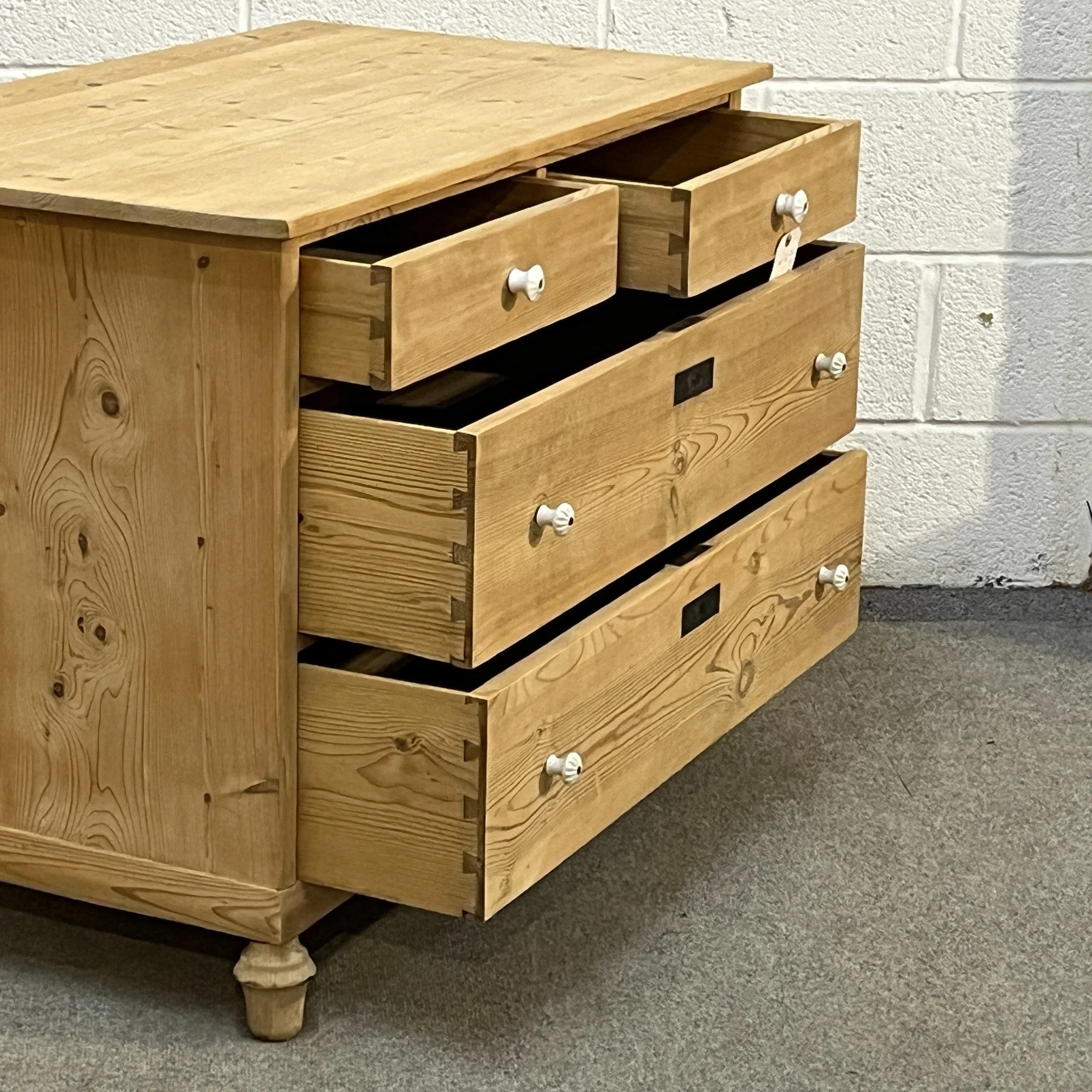 N7905C pine chest — drawers open showing their interiors