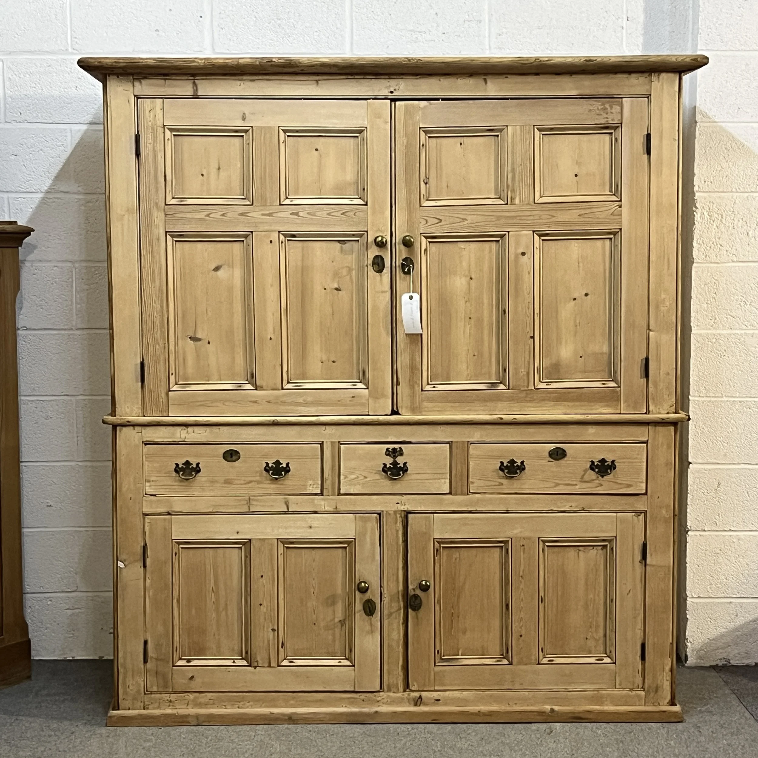 Straight-on full view of four-door early Victorian pine housekeeper’s cupboard N7700I