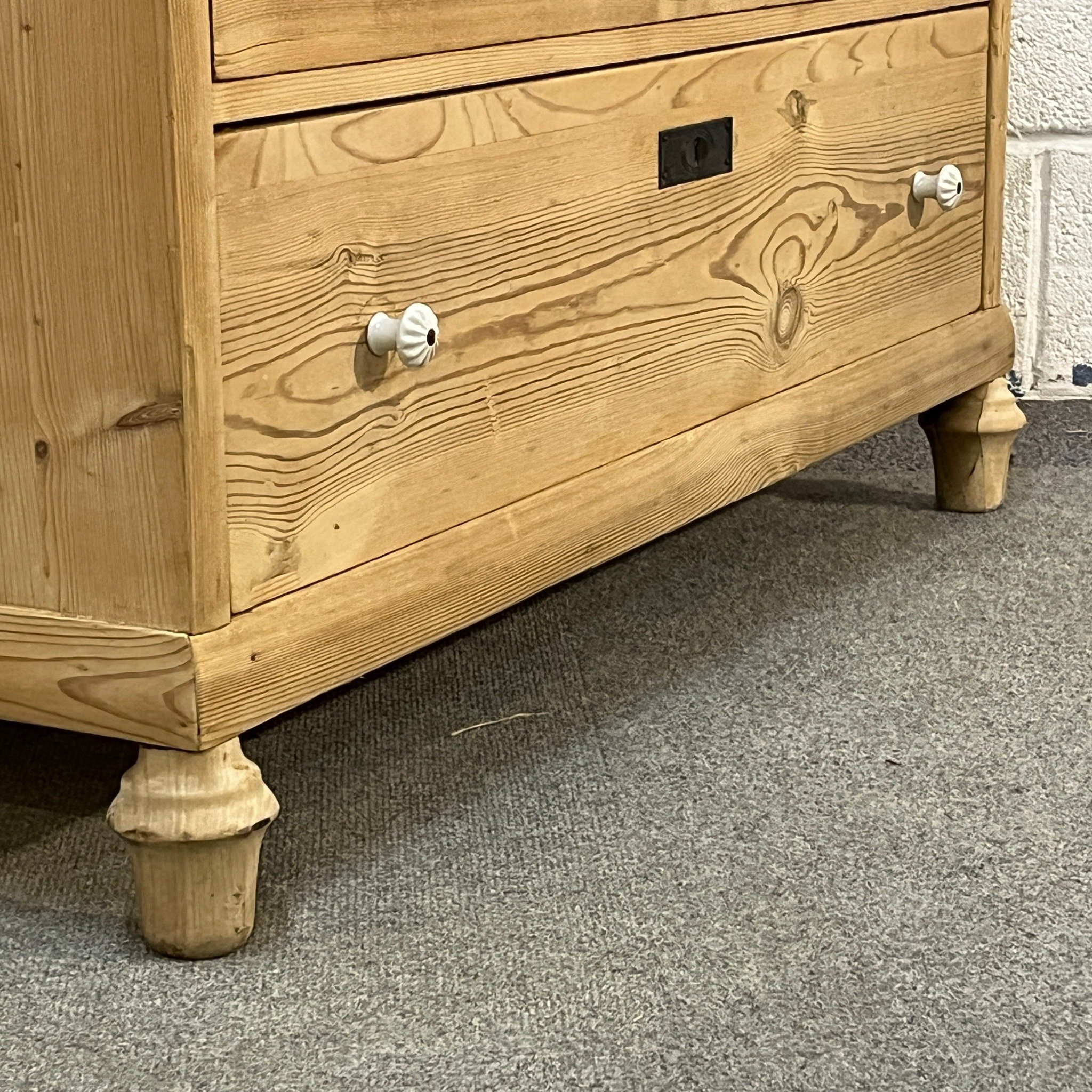 N7905C German pine chest — lower drawer fronts, porcelain knobs and original feet