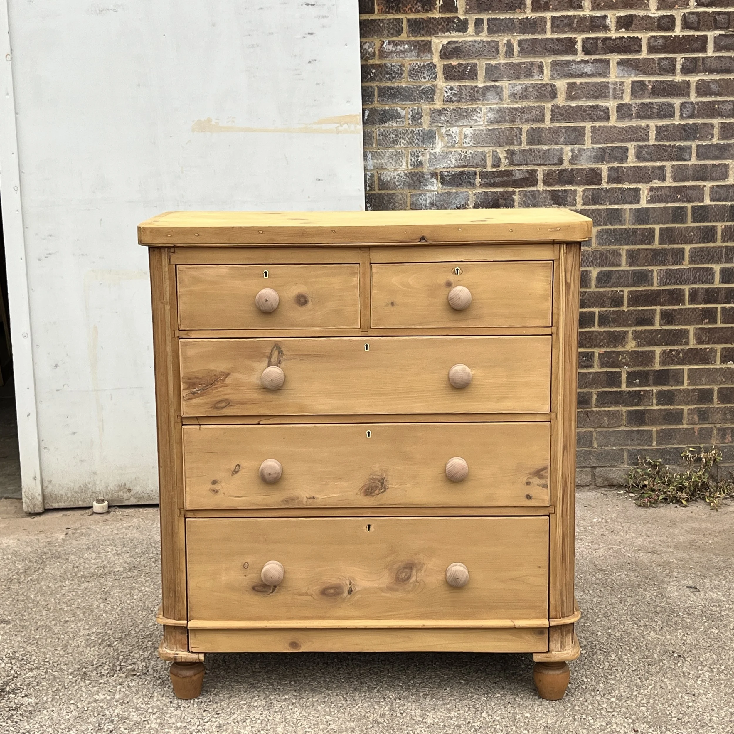 Straight-on front view of Victorian two-over-three pine chest N8709E