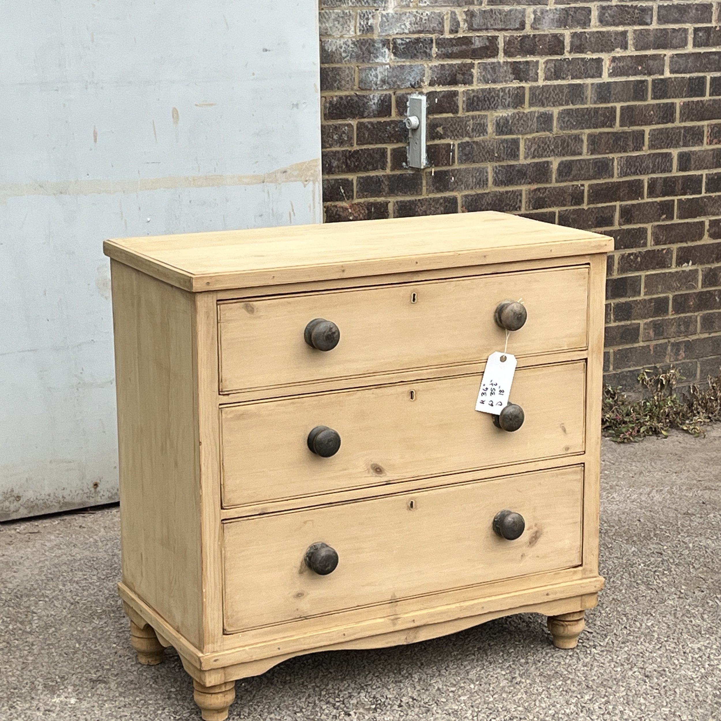 N4901D small Victorian pine chest of three drawers, front left view