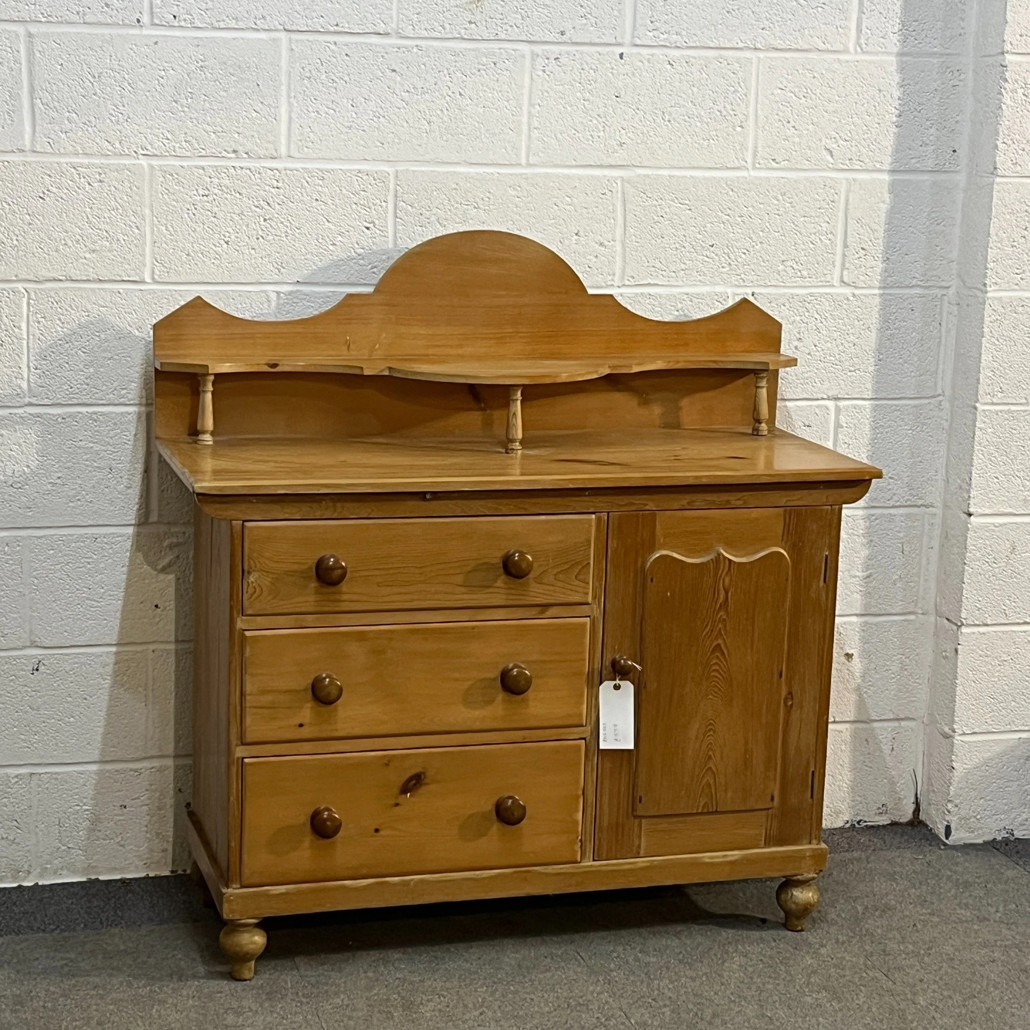 P0350E waxed pine Yorkshire base, full front view with three drawers and a cupboard