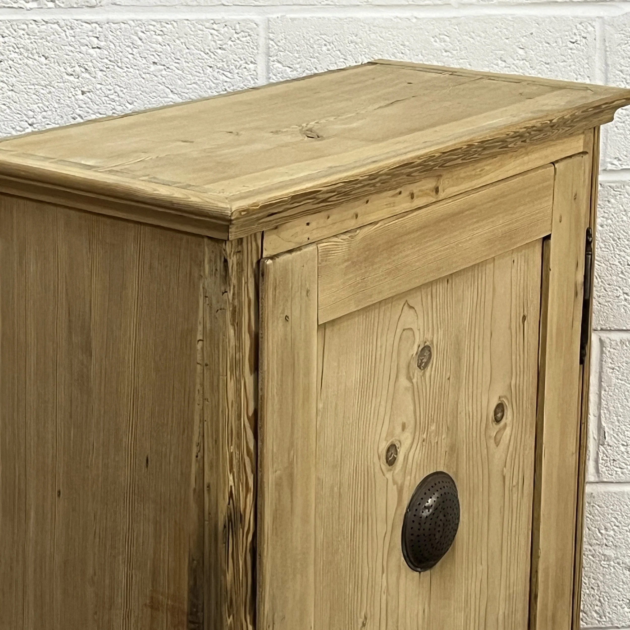 Close view of the top moulding and door of pine larder cupboard N3207C
