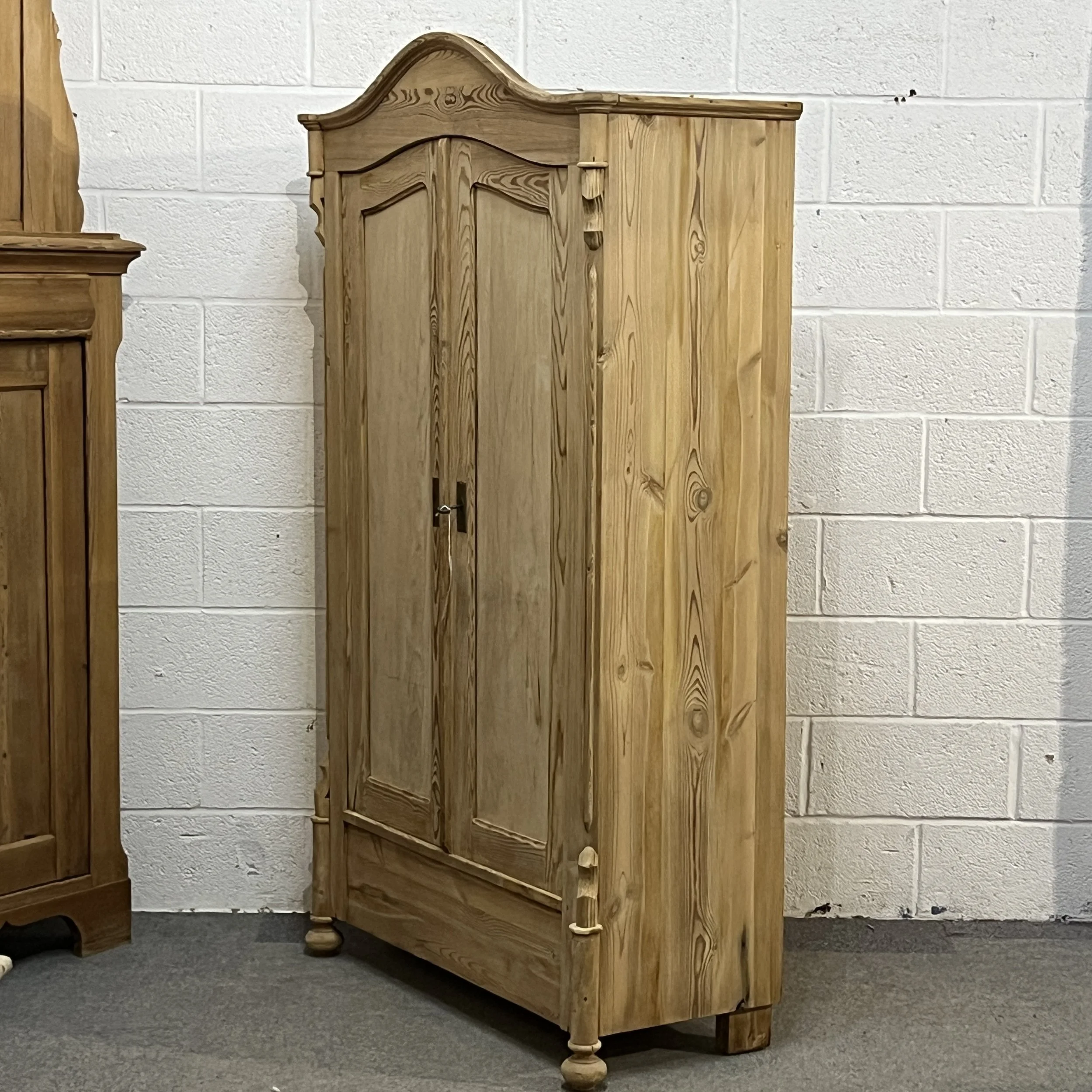 Right-side angle of antique pine armoire N3304D