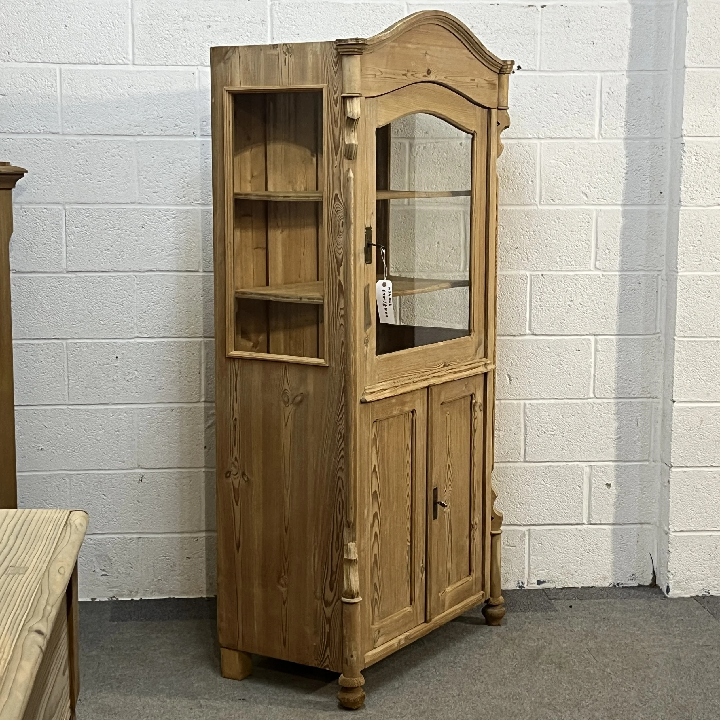 Left angled full view of antique pine cabinet N3404D showing glazed side and decorative front
