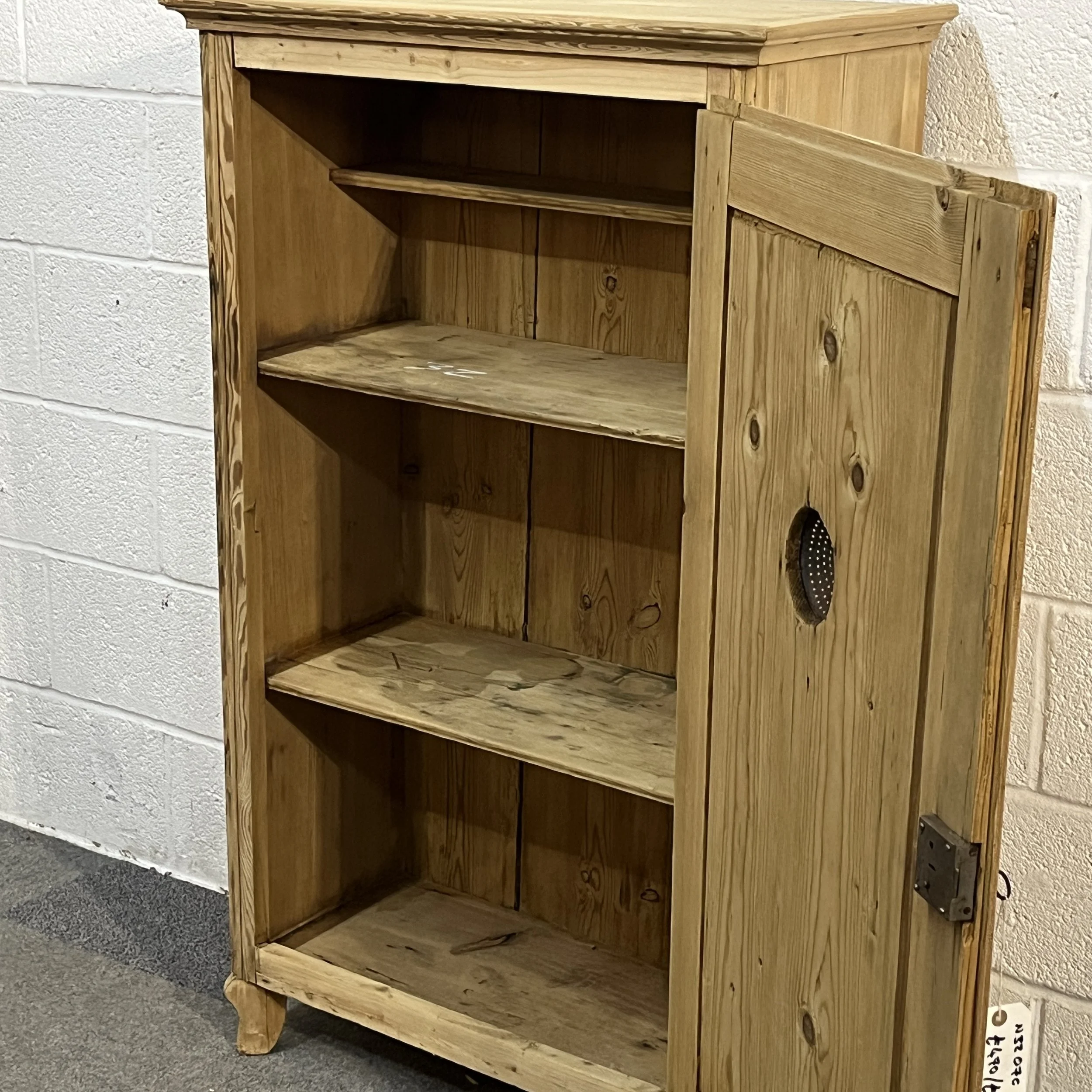 Angled interior view of pine larder cupboard N3207C and shelving