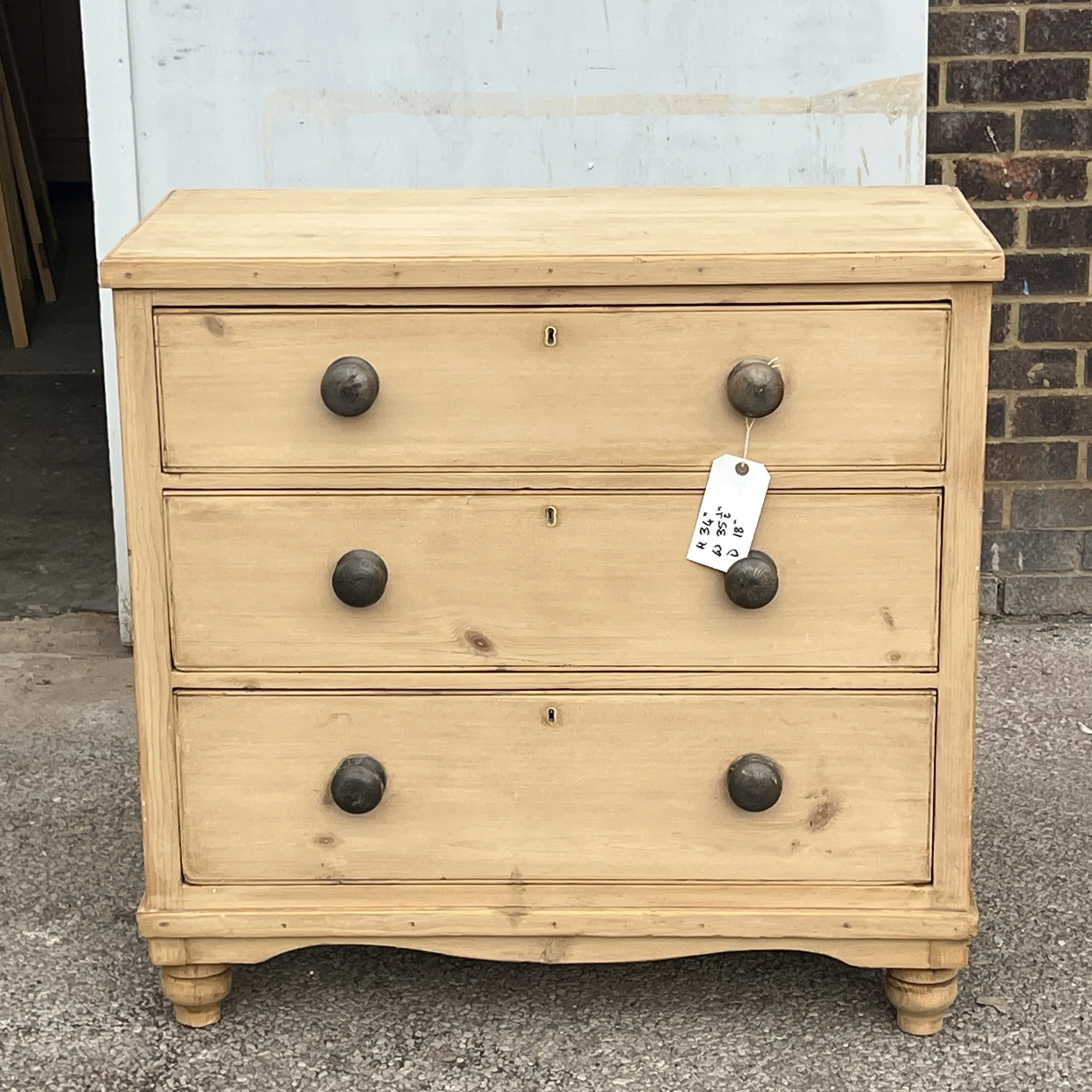 N4901D small Victorian pine chest of three drawers, straight-on front view