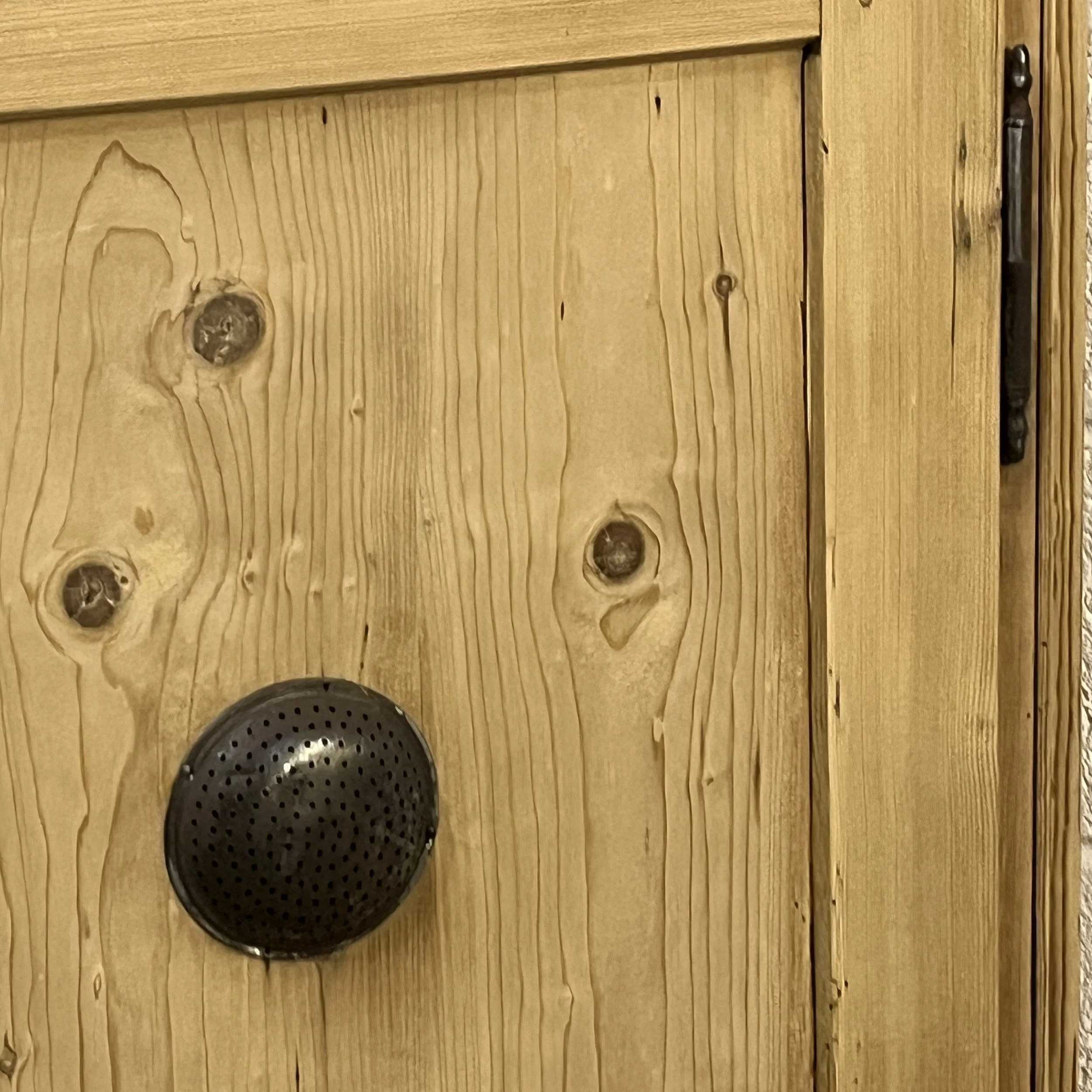 Detail of the original circular vent in pine larder cupboard N3207C