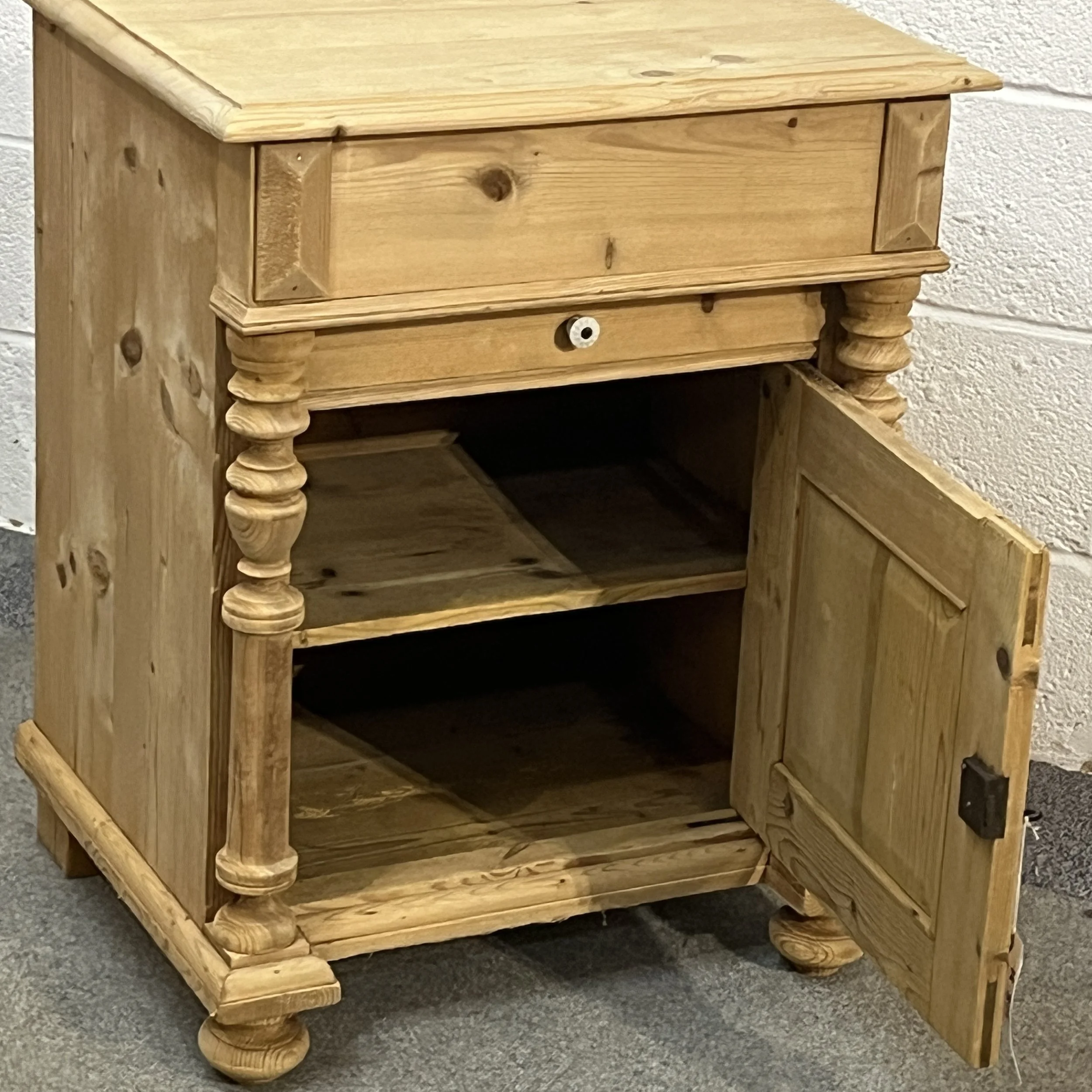Open cupboard door showing the single shelf inside the antique pine wash cupboard