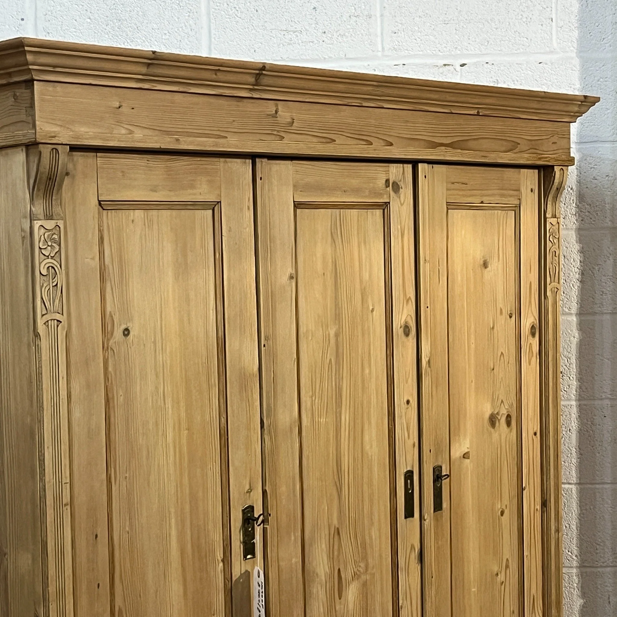 N4700F upper front detail showing moulded cornice and carved corner decoration