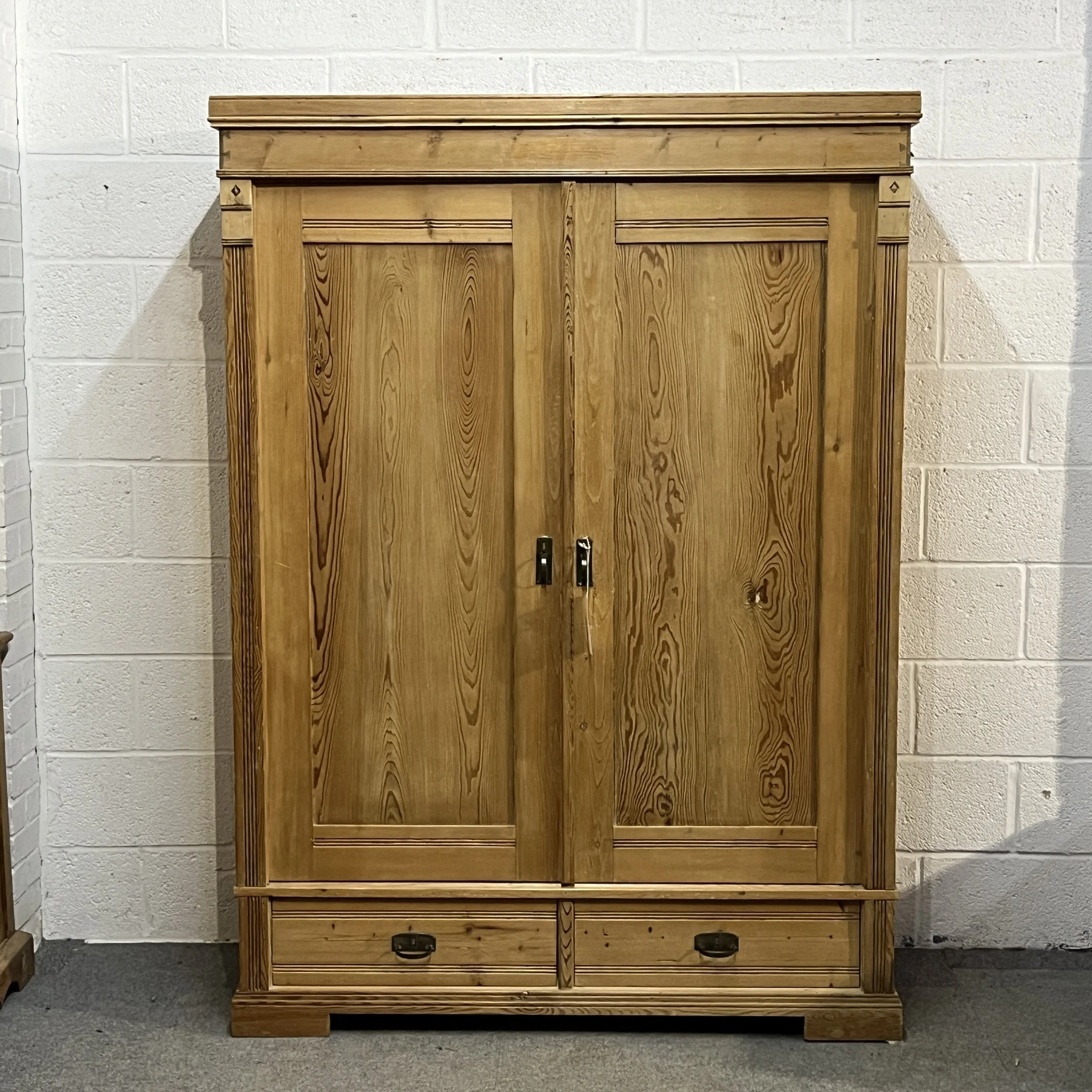 Double antique pine wardrobe with drawers
