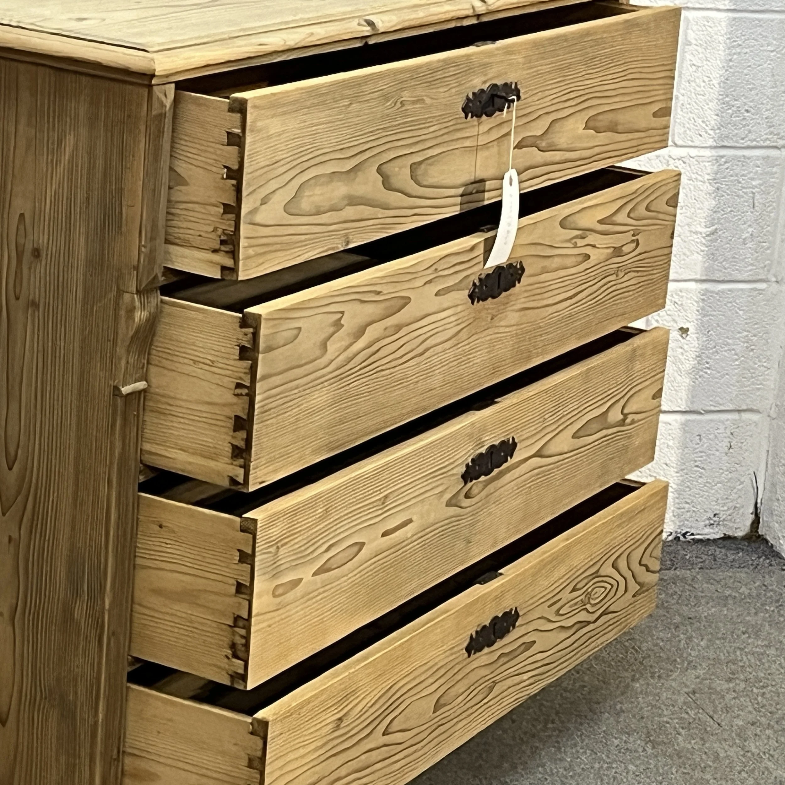 Open drawers of antique pine chest N7308C showing dovetail joints