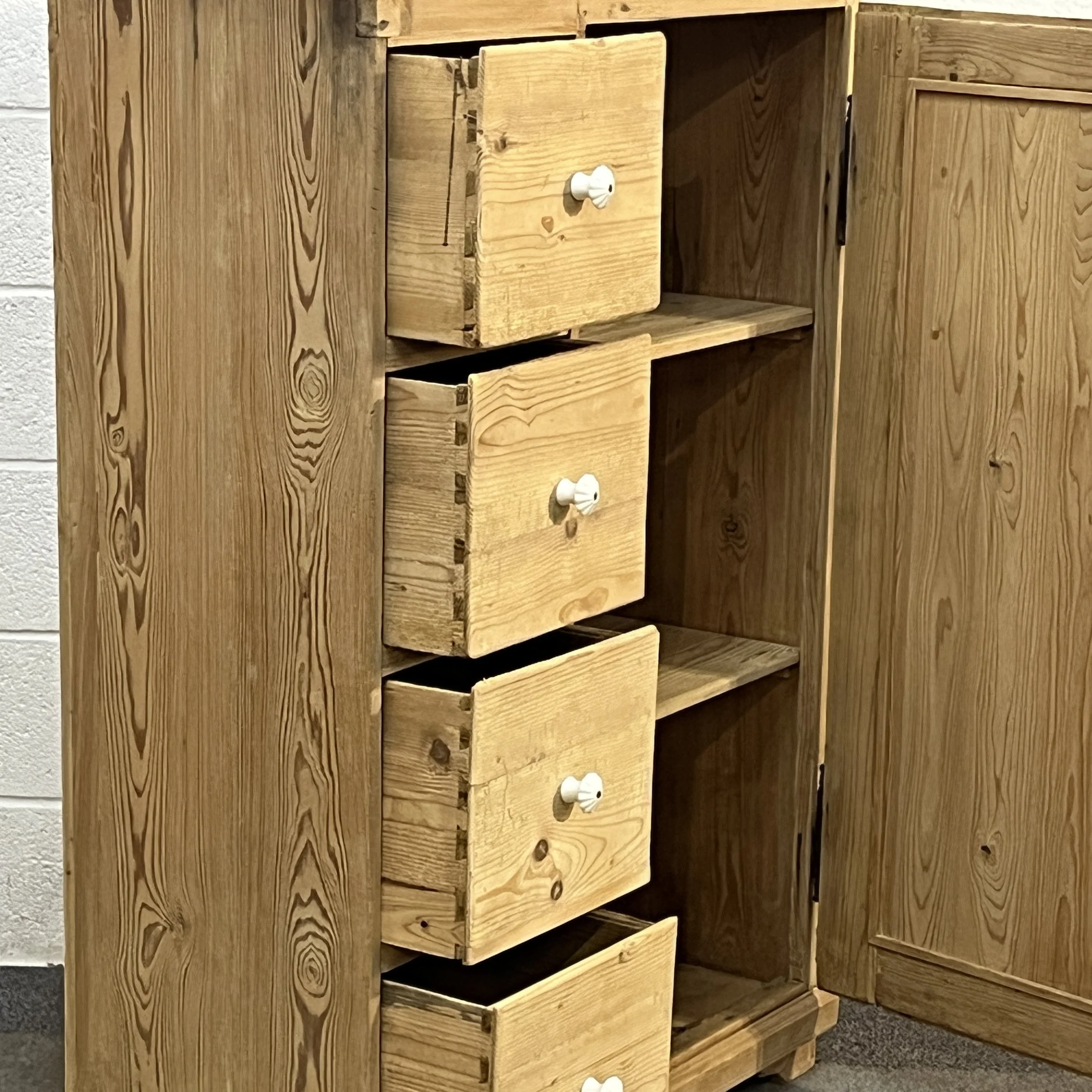 Open drawers on antique pine cupboard N7408C showing dovetail joints and wooden interiors