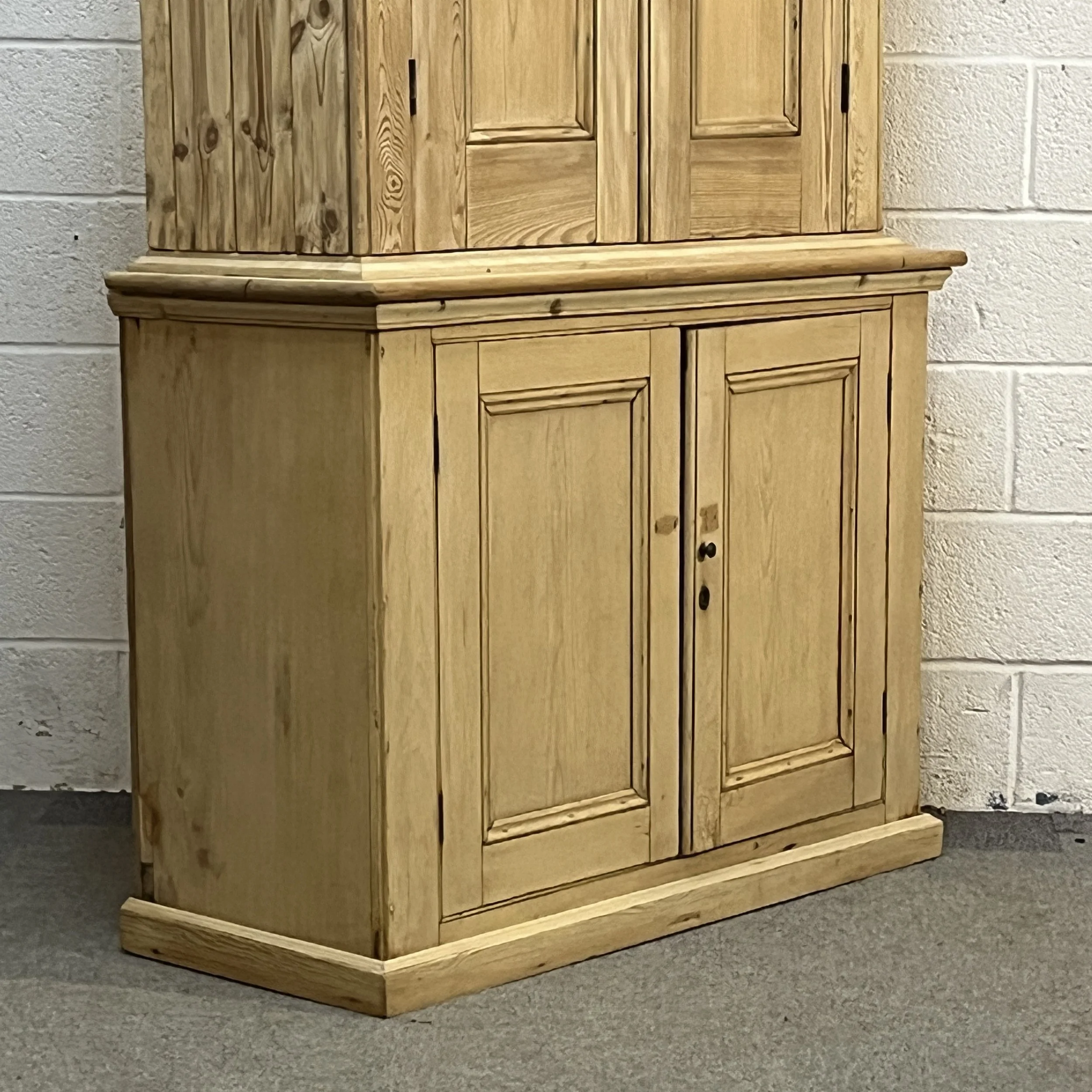 Large old pine cupboard N7809E lower cupboard angled view with panelled side and doors