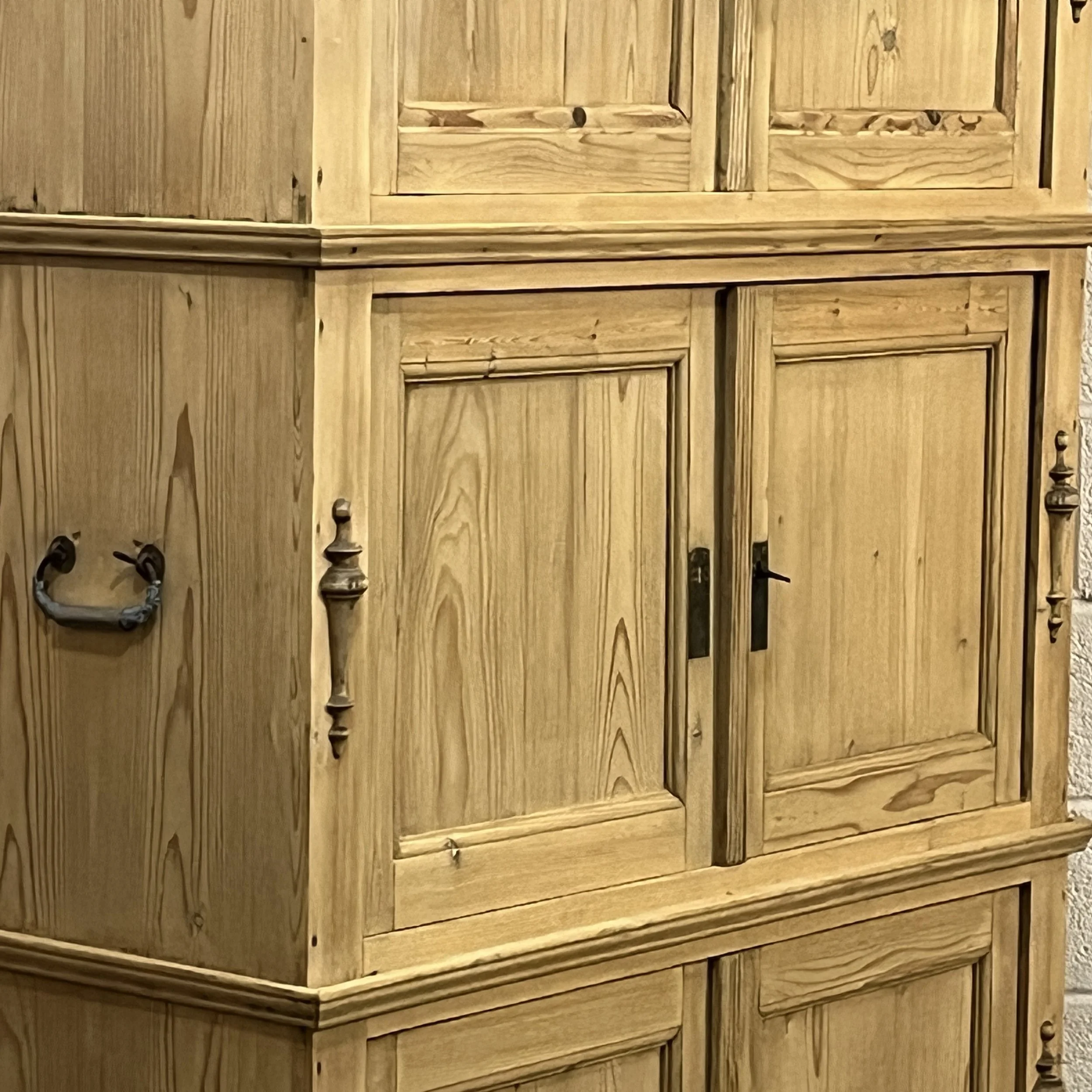 Close-up of the pine campaign cupboard middle doors, hinges and side handle
