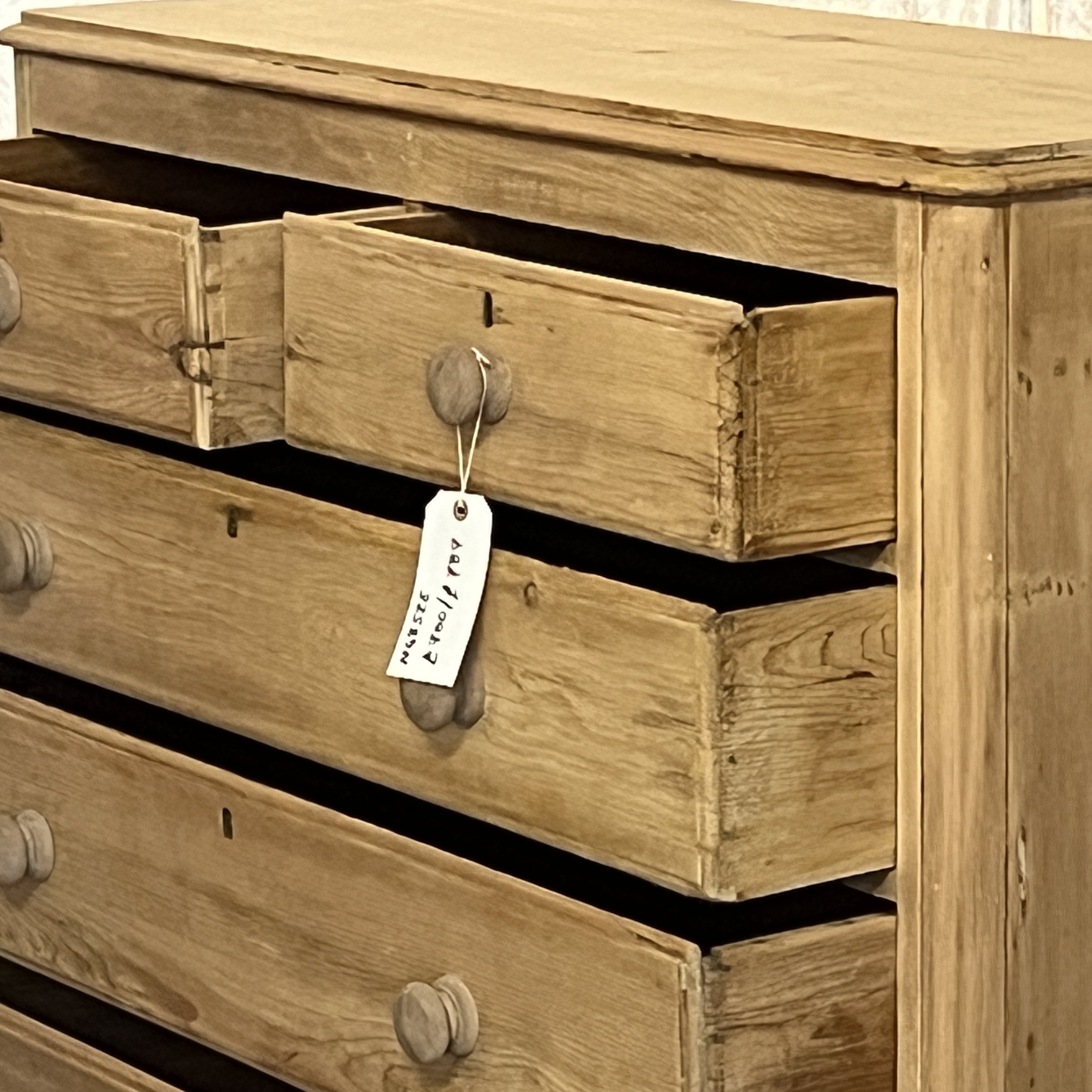N4852E pine chest with drawers open, showing drawer interiors and dovetail construction