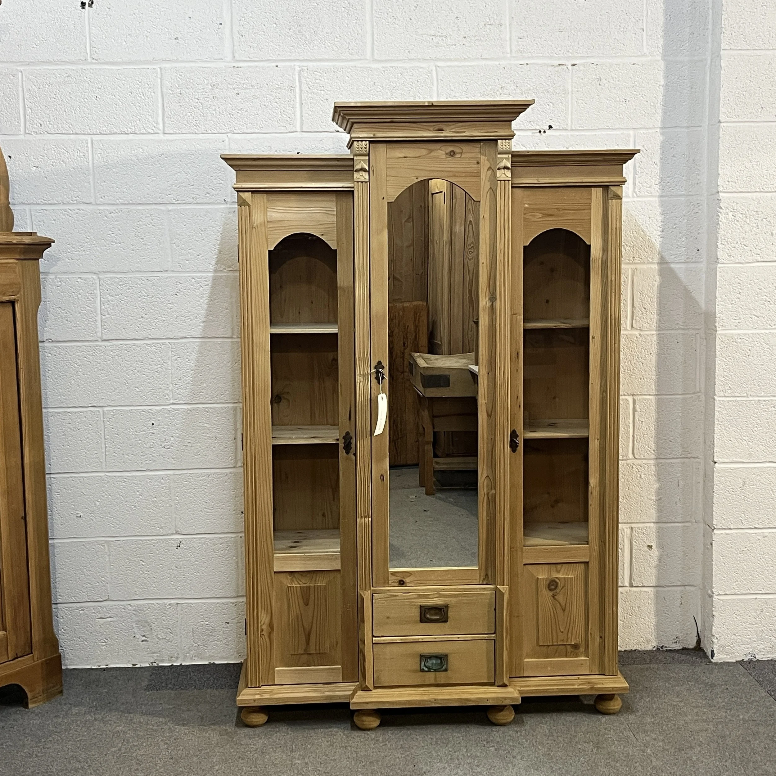 Full front view of triple-door reclaimed pine display cabinet N7500D with central mirror and two drawers