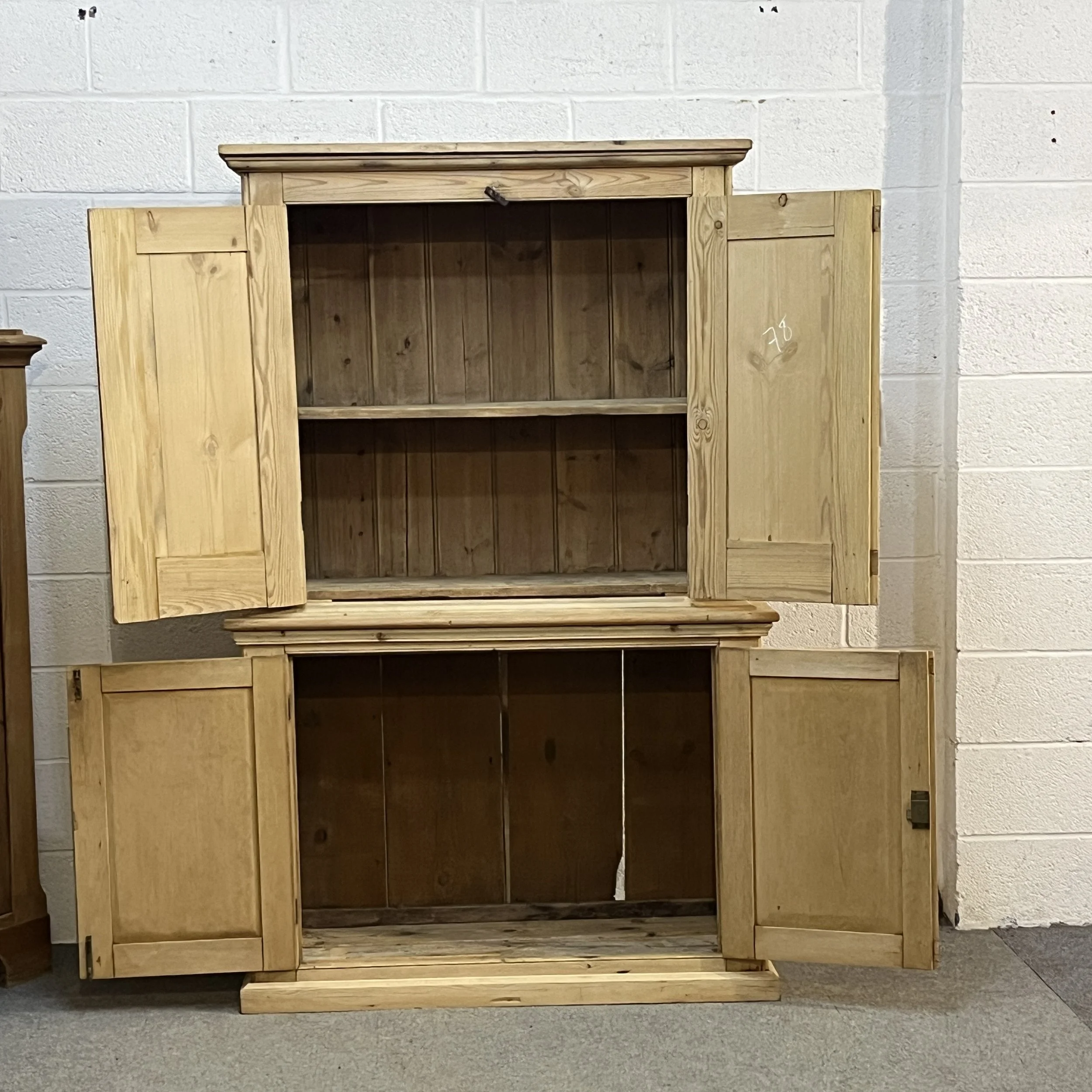Large old pine cupboard N7809E with all four doors open, showing upper shelf and empty base