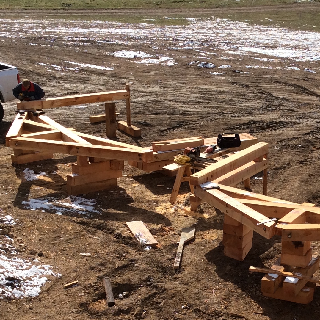 Outlaw working on site on our deck trusses.