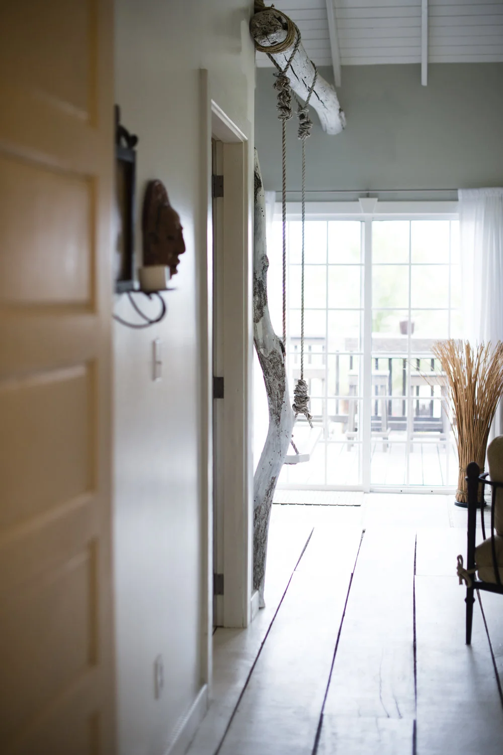Exotic art, Belizean wood rustic floors, sliding doors walk out to a large veranda