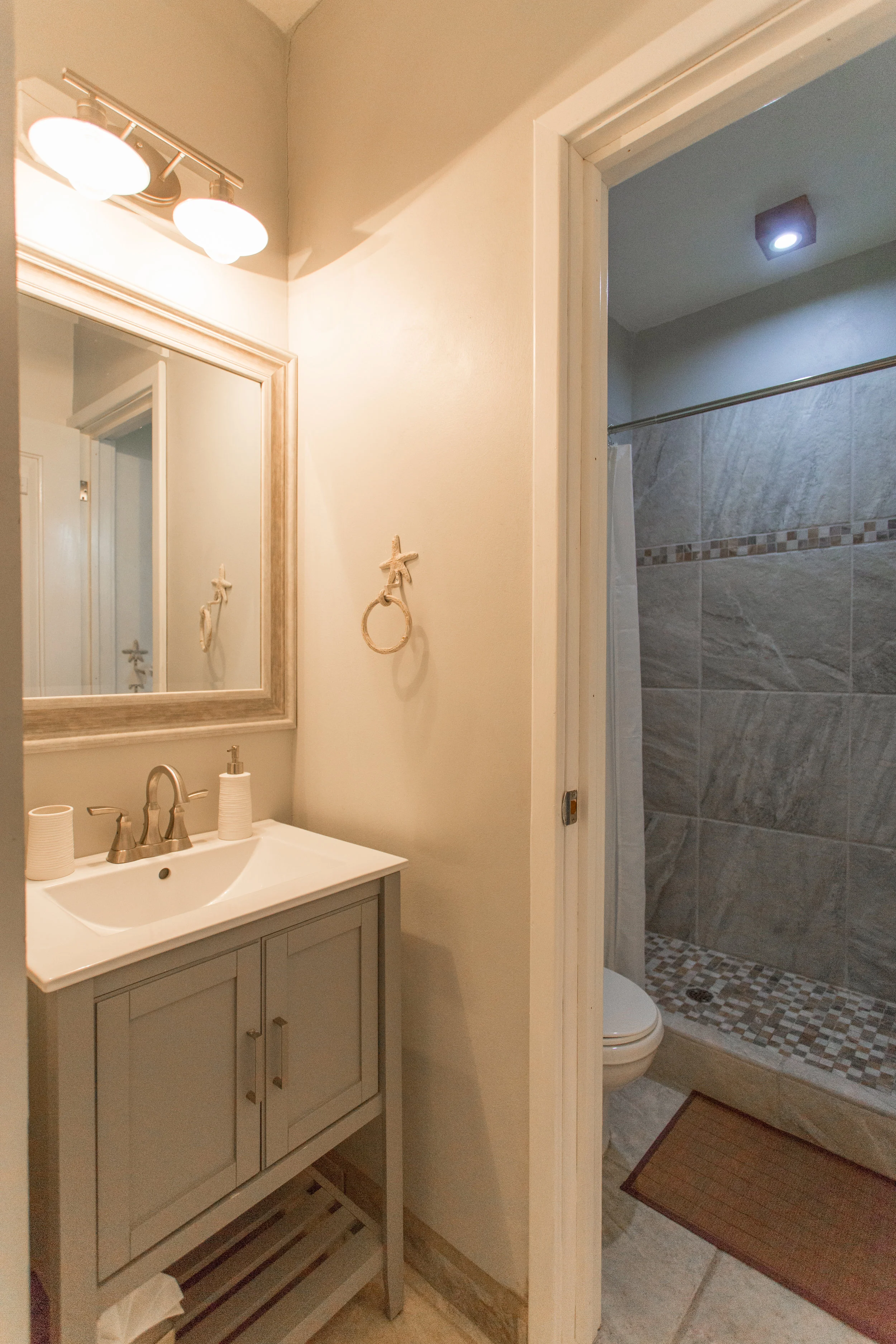 Our serene bathroom area has a separate room with shower and toilet....