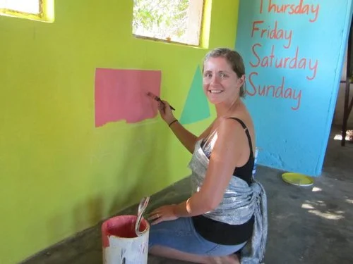 Painting a school in Mwaya, Malawi